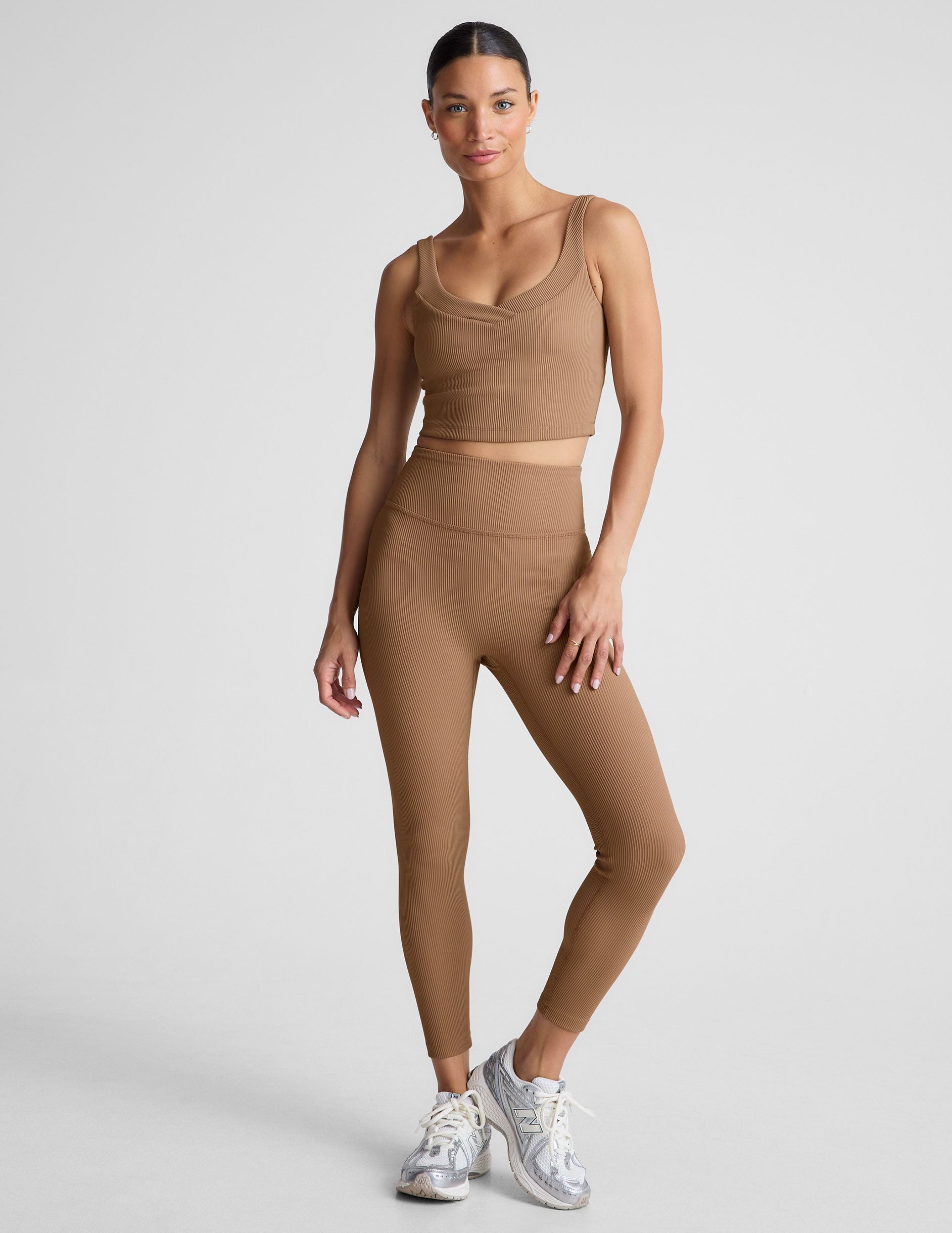 brown ribbed cropped tank with front and back v necklines.