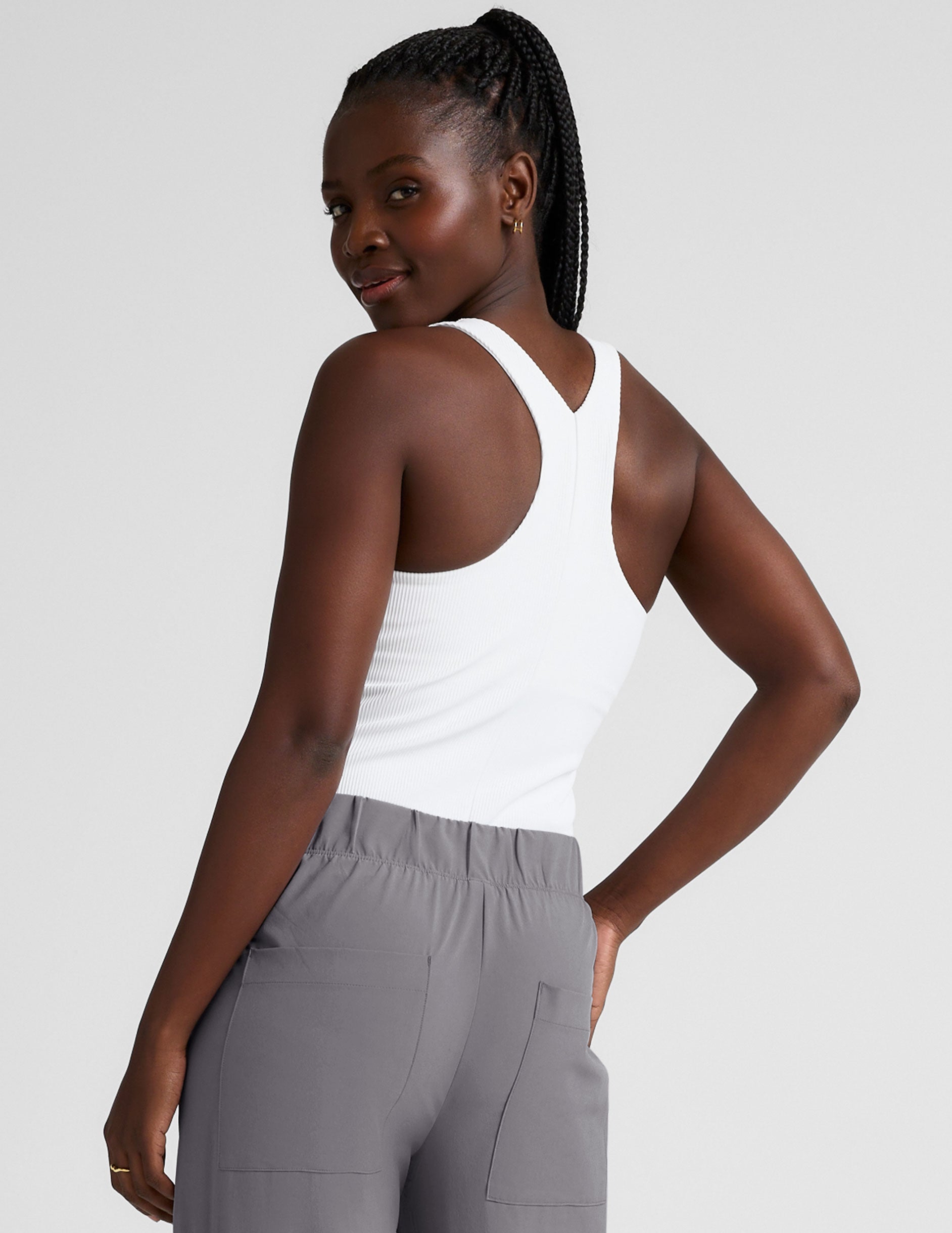 white high-neck ribbed racerback tank top.