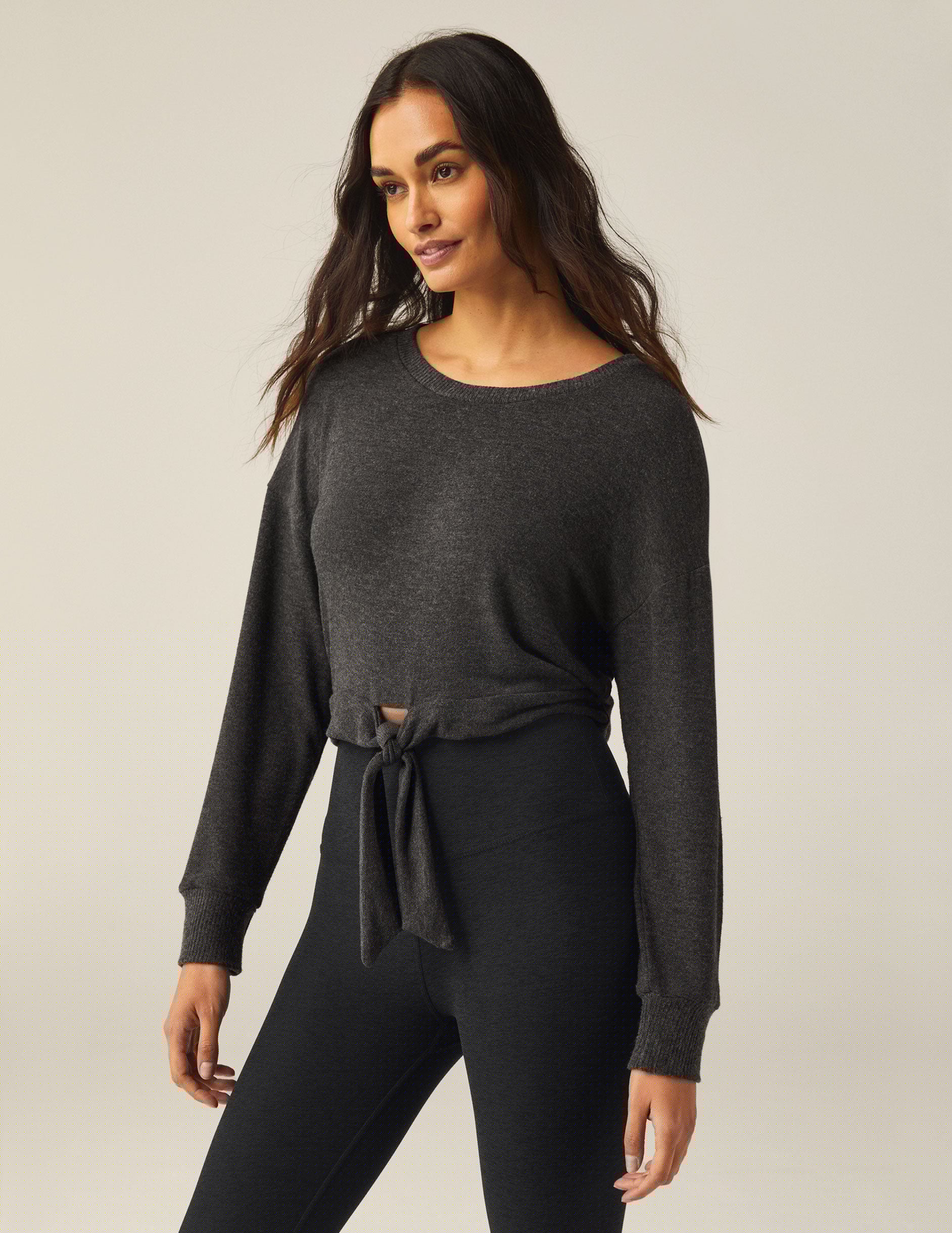 gray scoop neck cropped pullover with a front tie detail.