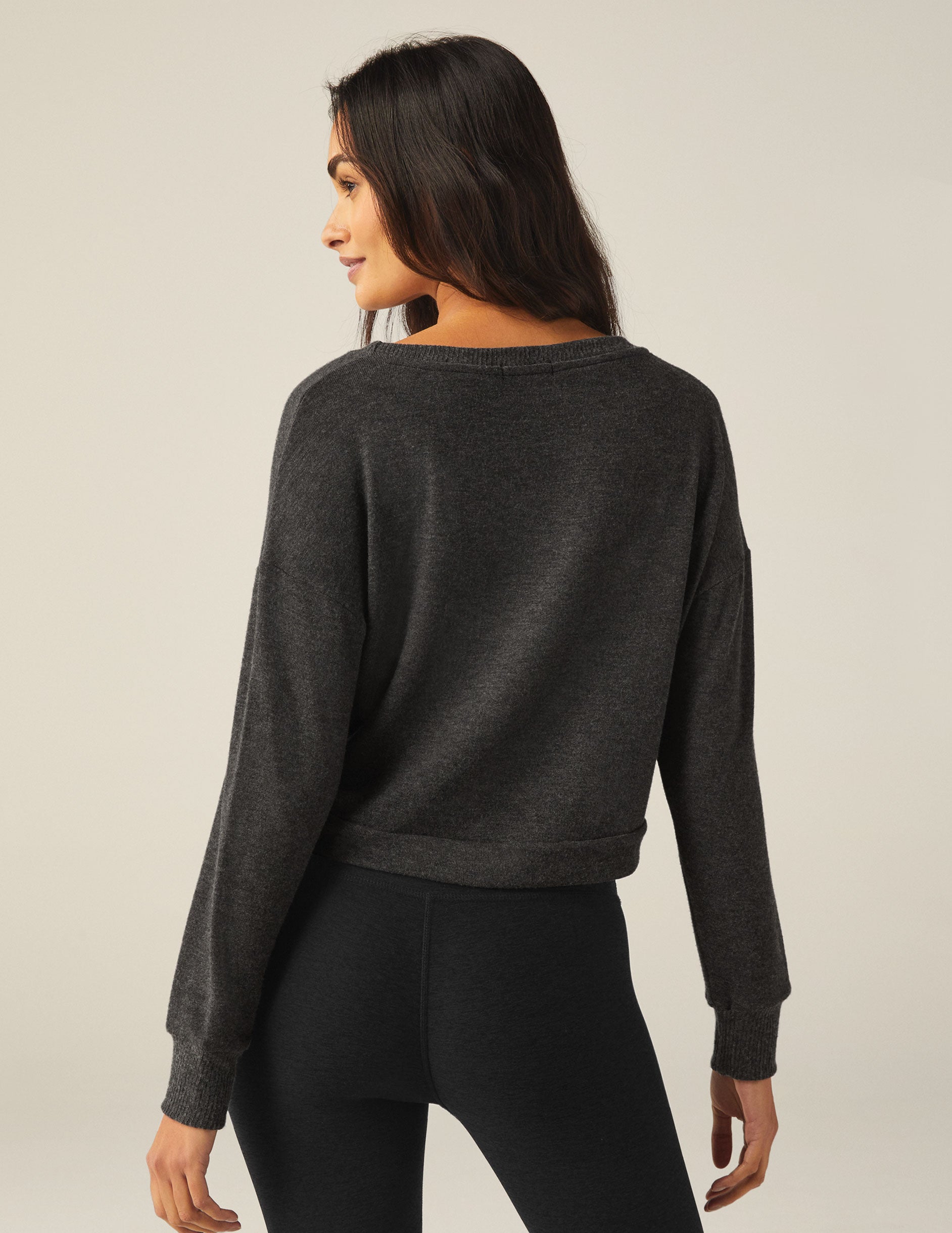 gray scoop neck cropped pullover with a front tie detail.