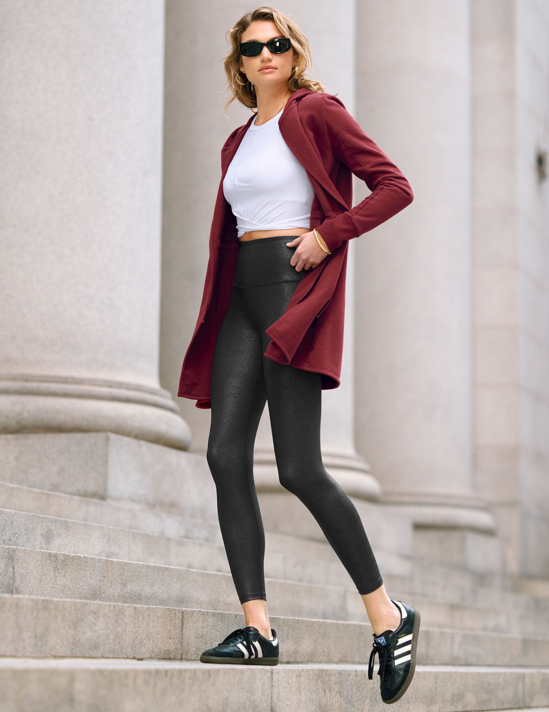 black leather high-waisted midi leggings.