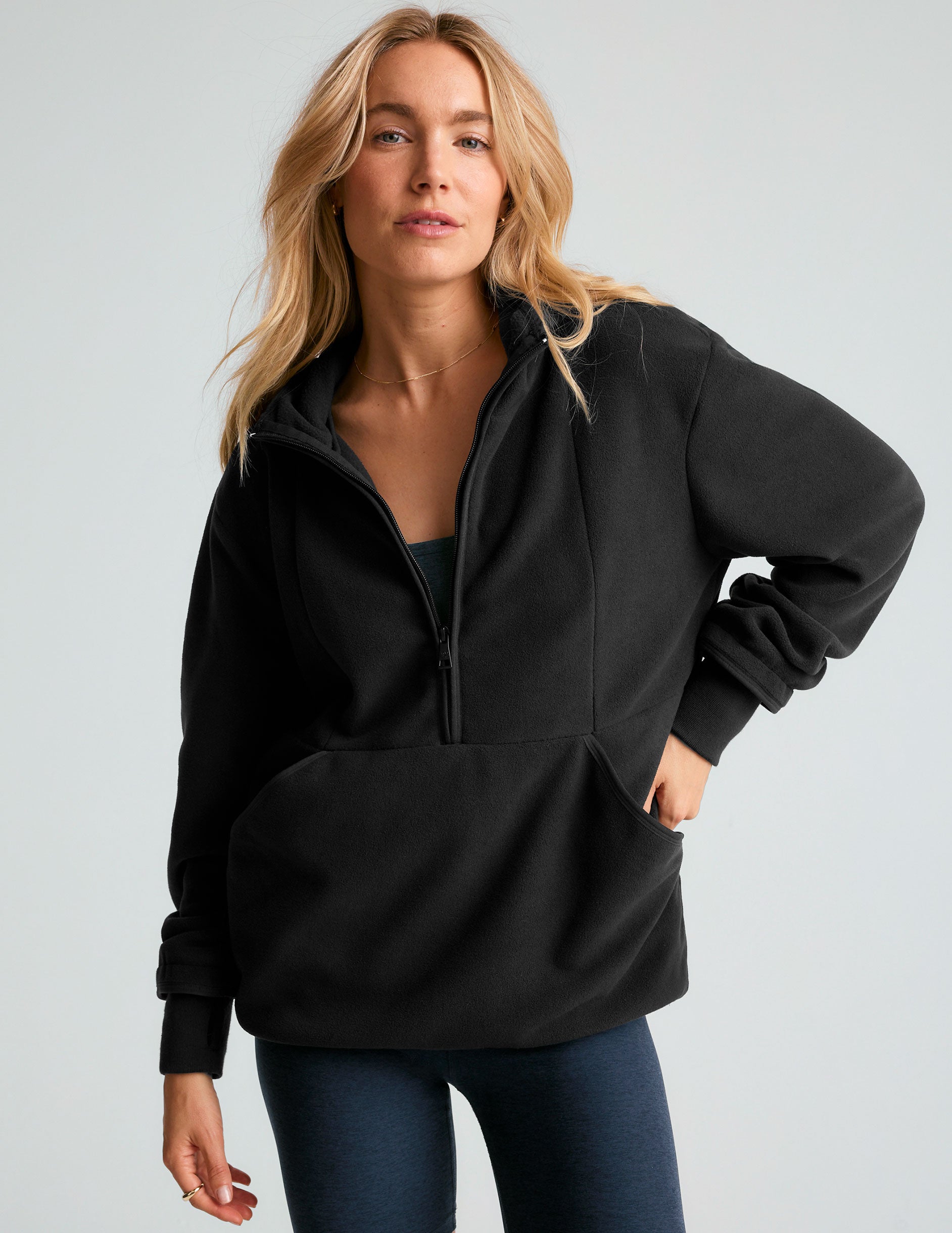 black fleece quarter zip hooded pullover.