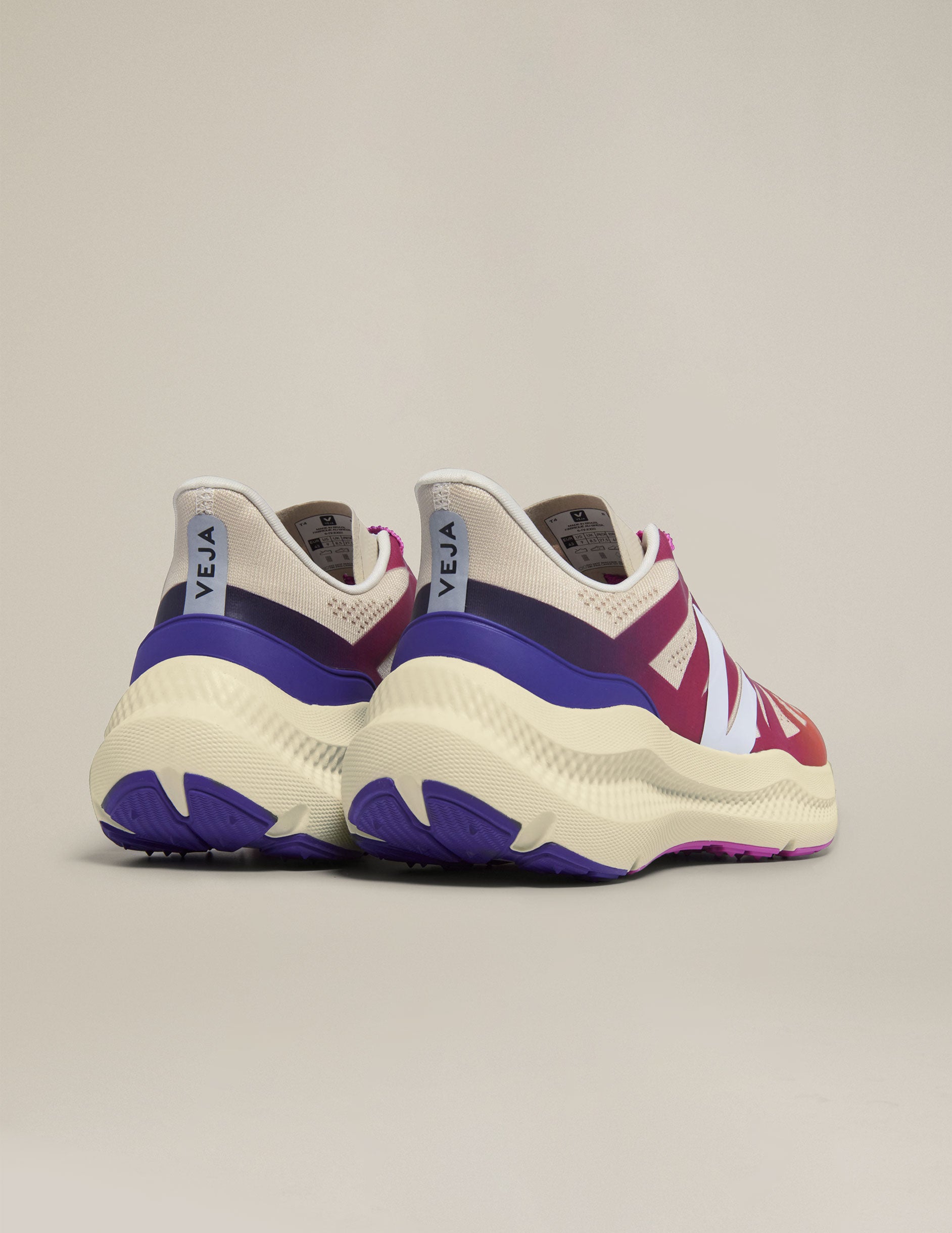 white, purple, orange, and blue condor 3 sneakers.
