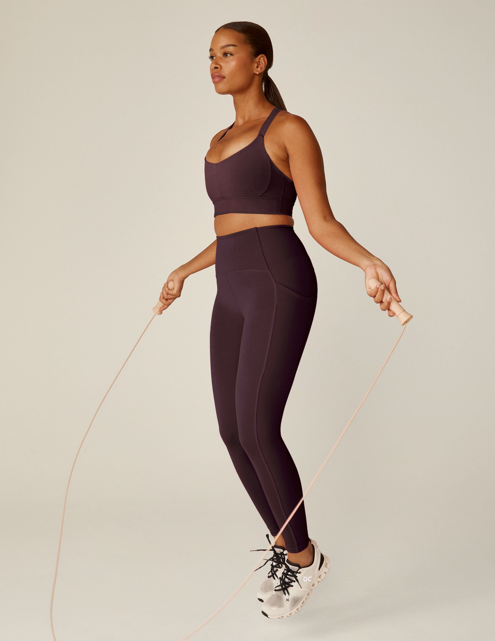 purple midi length leggings with pockets.