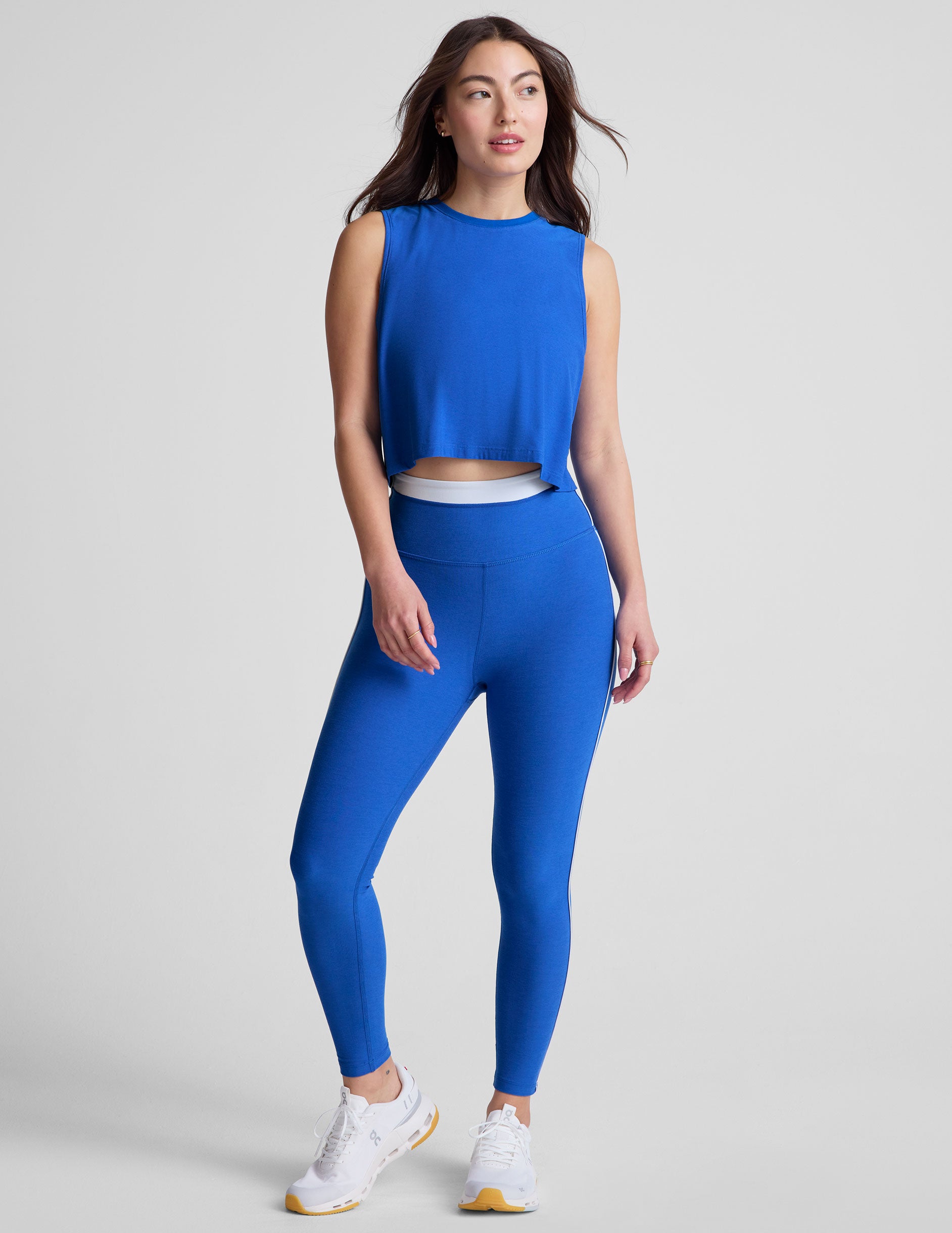 blue relaxed fit cropped tank with a scooped, ribbed neckline and ribbed arm holes.