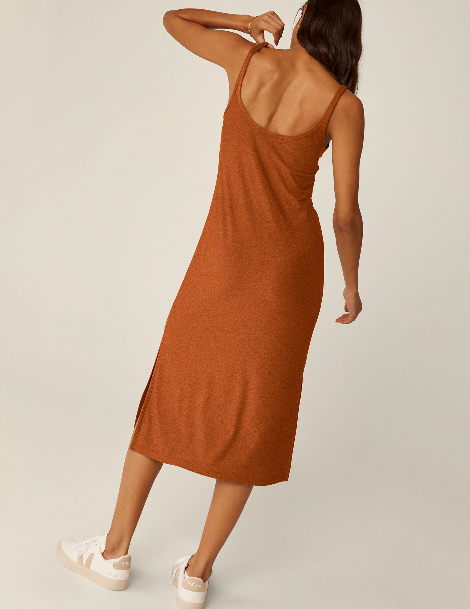 brown scoop neck midi dress with slits on each side.
