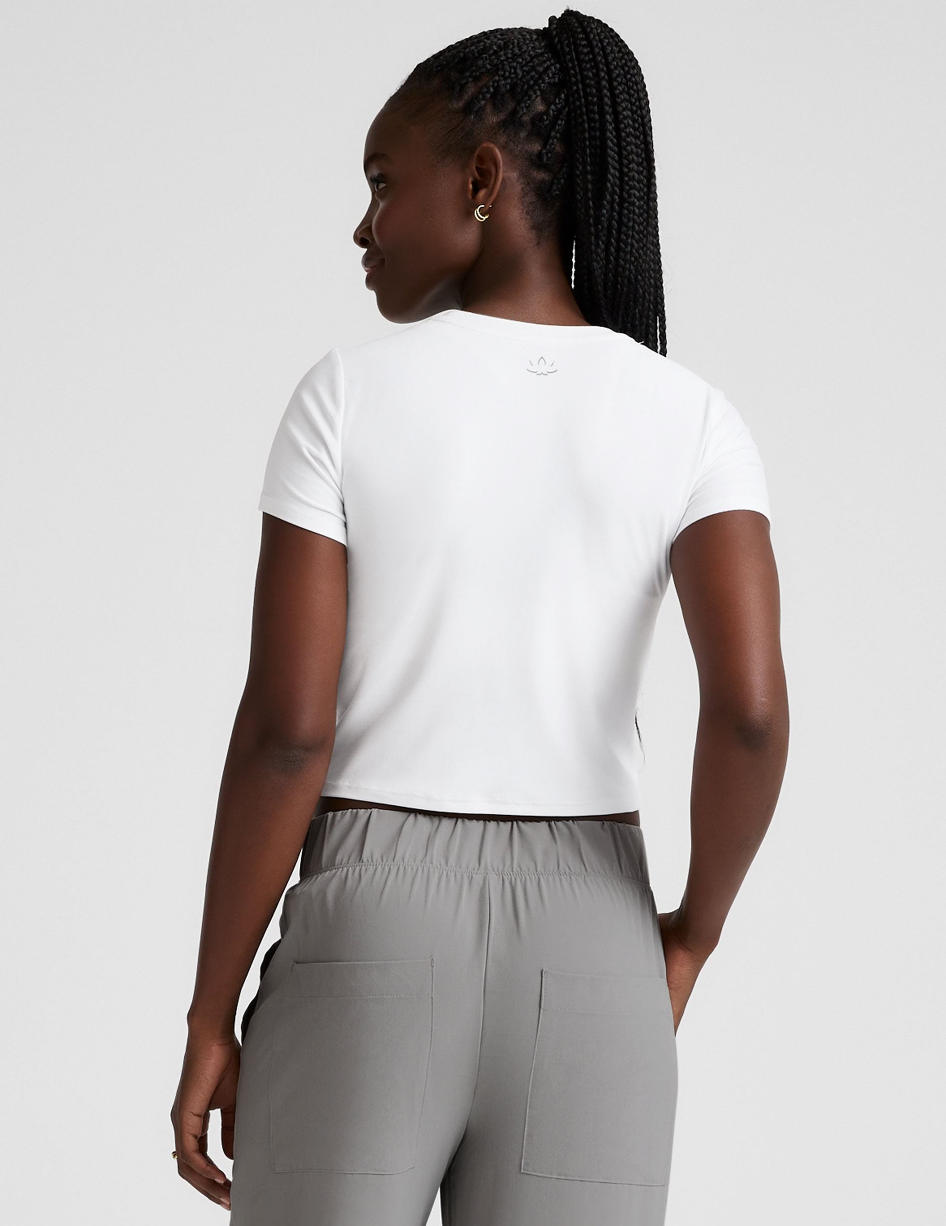 white cropped baby tee.