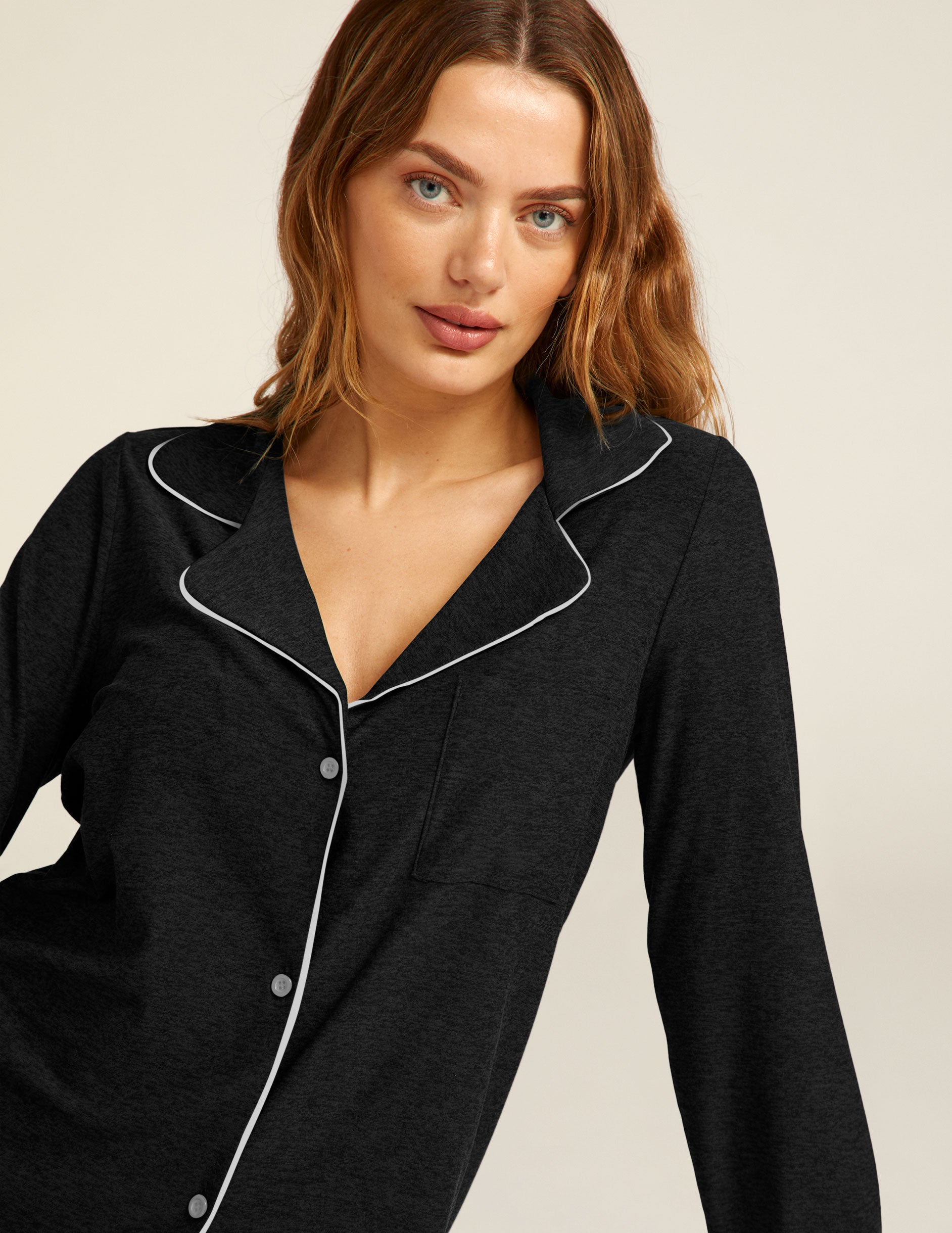 black long sleeve sleep top with white piping.