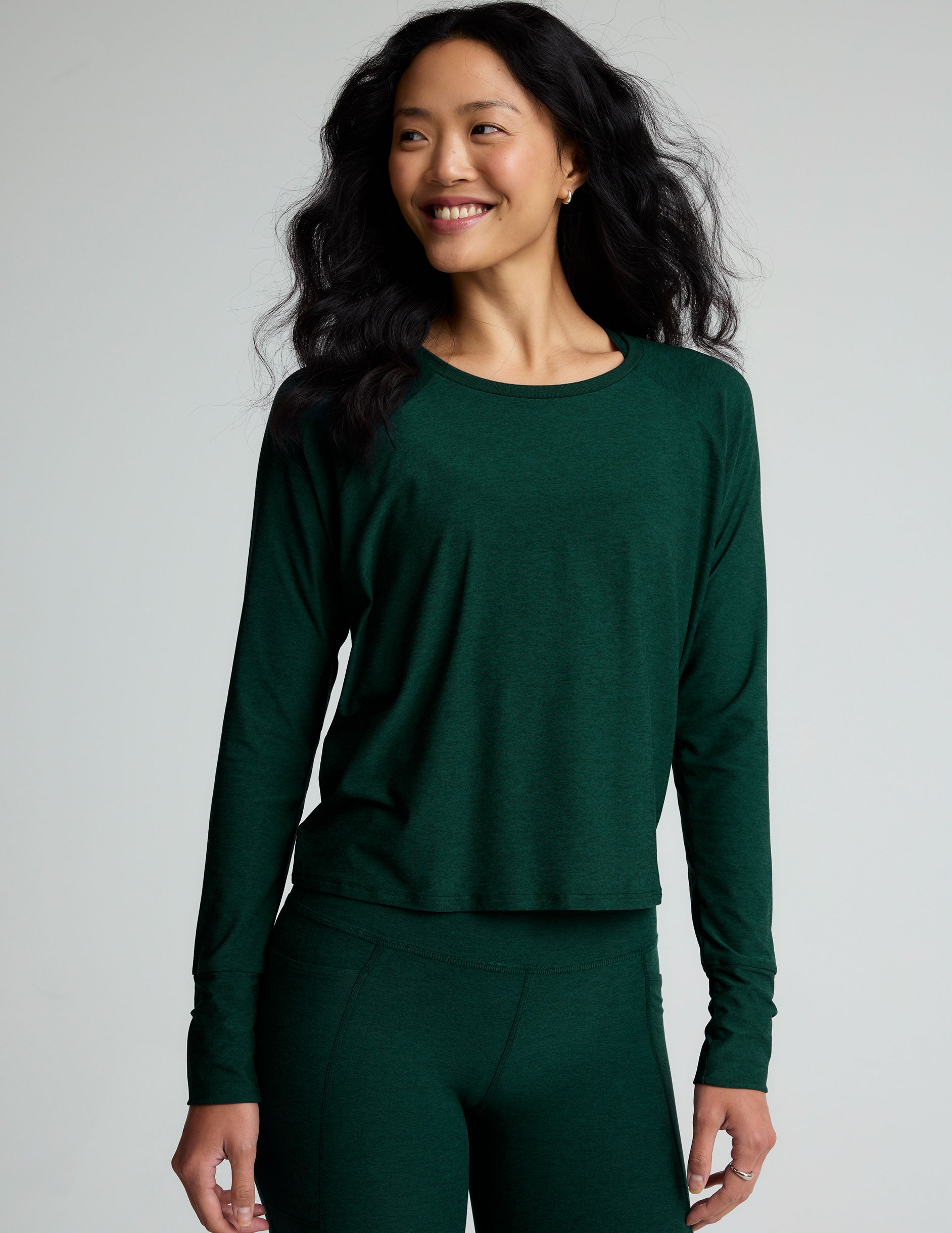 green scoop neck long sleeve lightweight top.