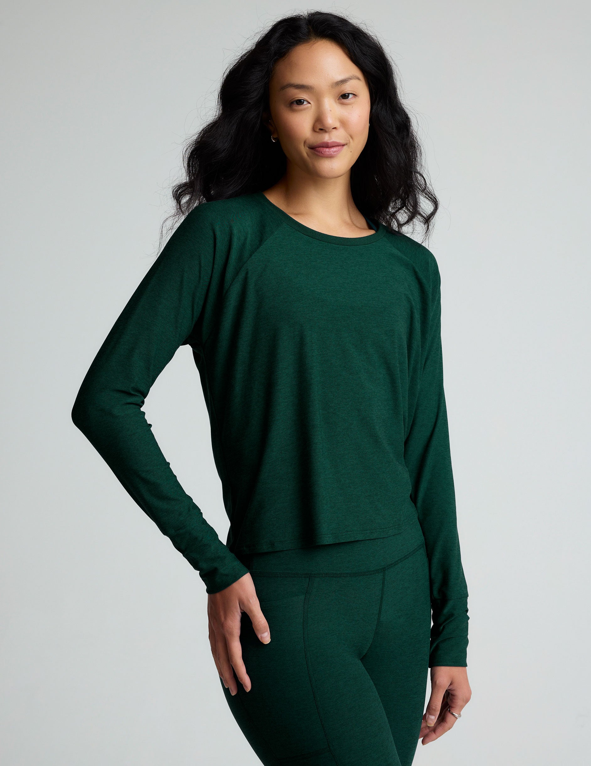 green scoop neck long sleeve lightweight top.