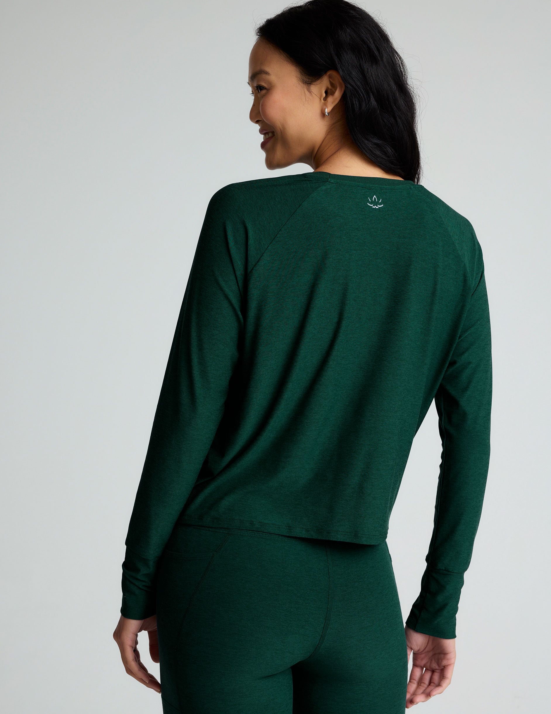 green scoop neck long sleeve lightweight top.