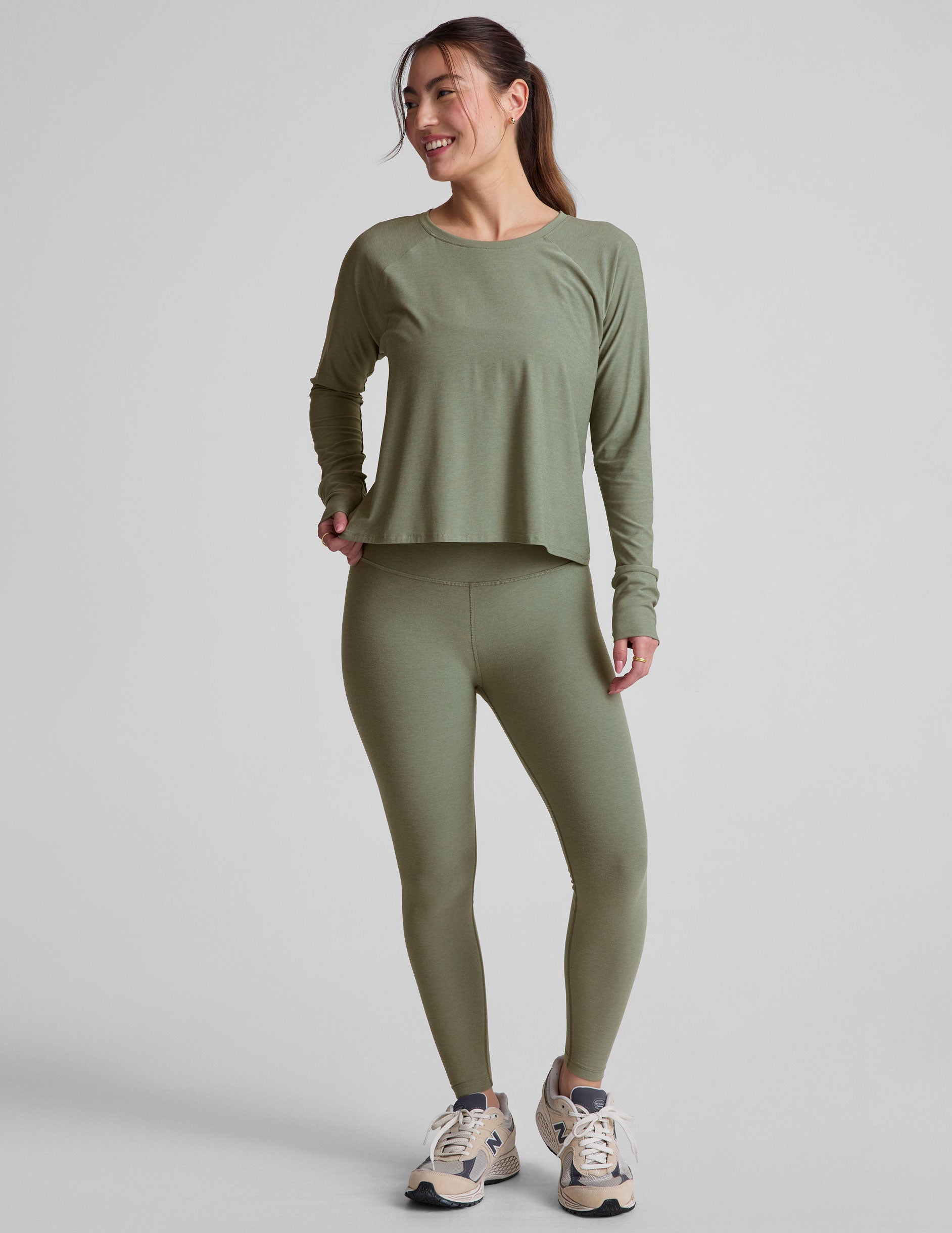 green scoop neck long sleeve relaxed fit top.