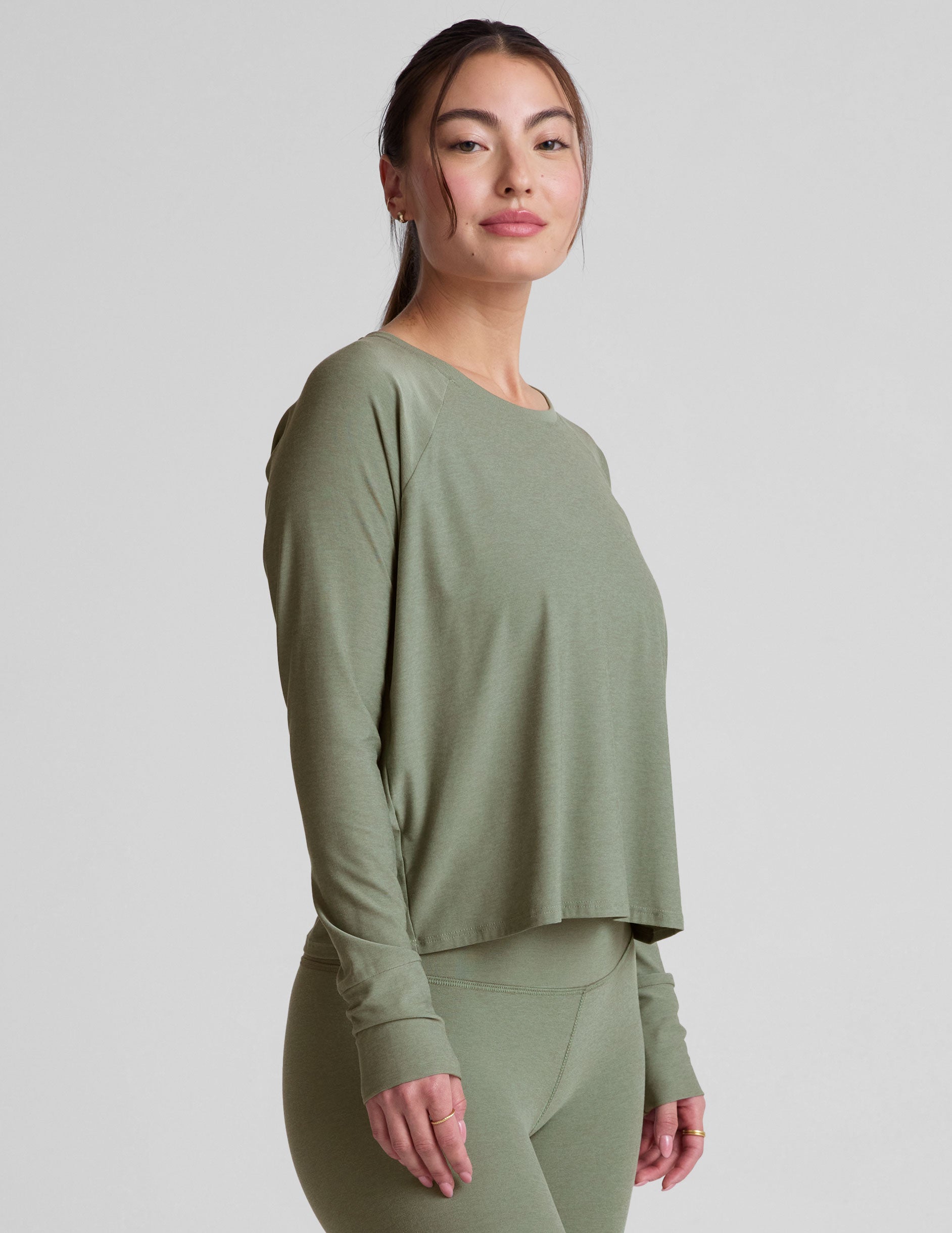 green scoop neck long sleeve relaxed fit top.
