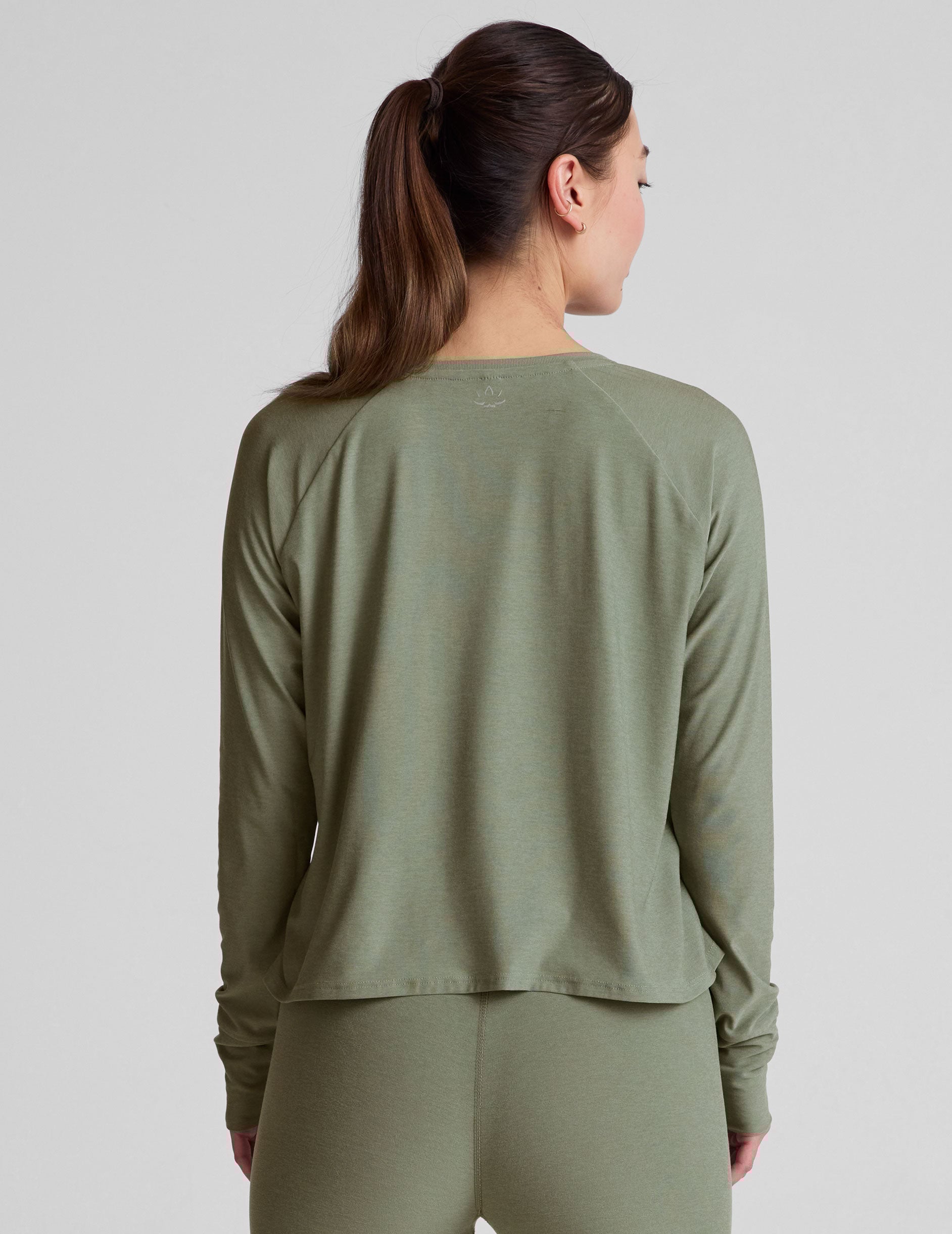 green scoop neck long sleeve relaxed fit top.