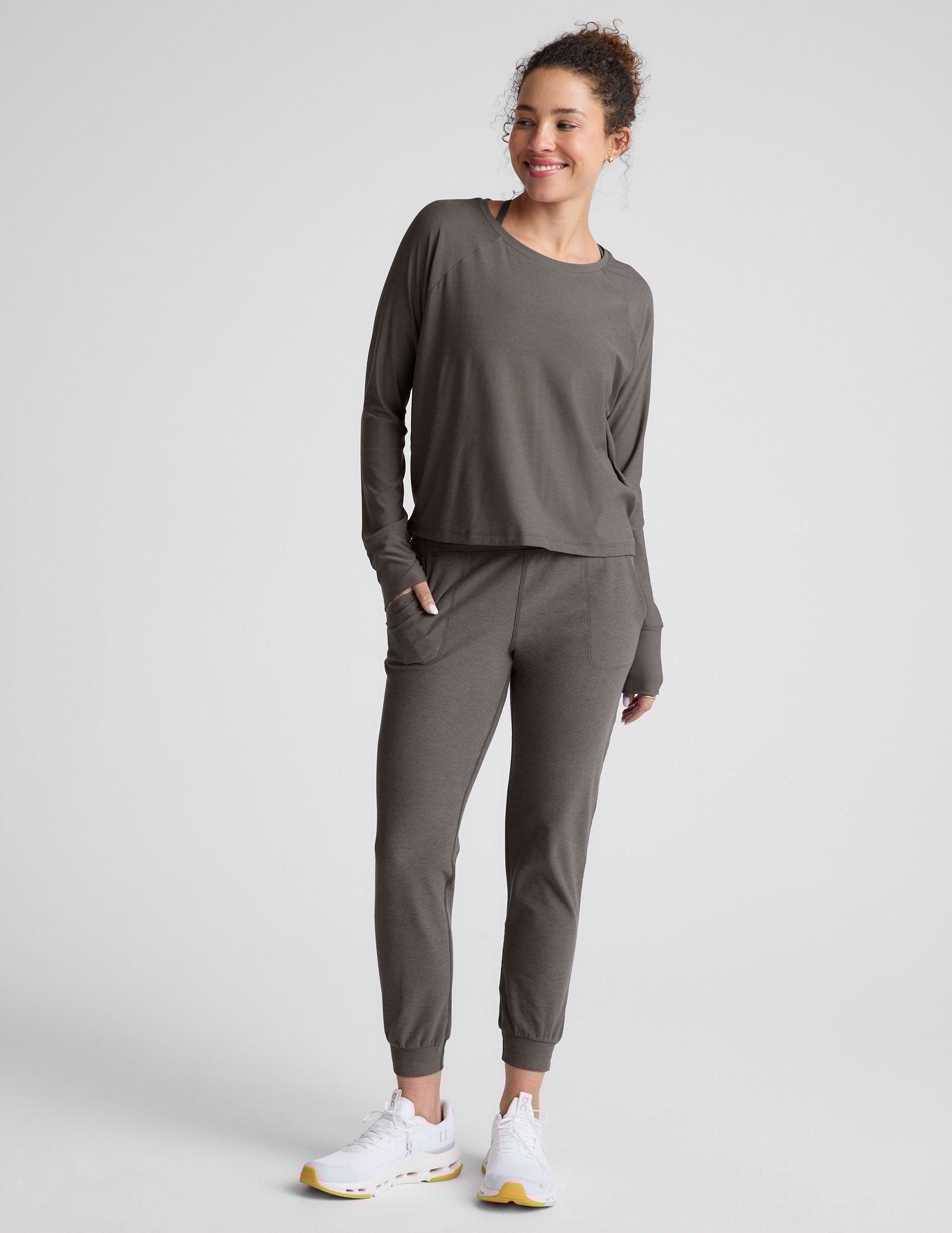 gray long sleeve lightweight top with a crew neckline.