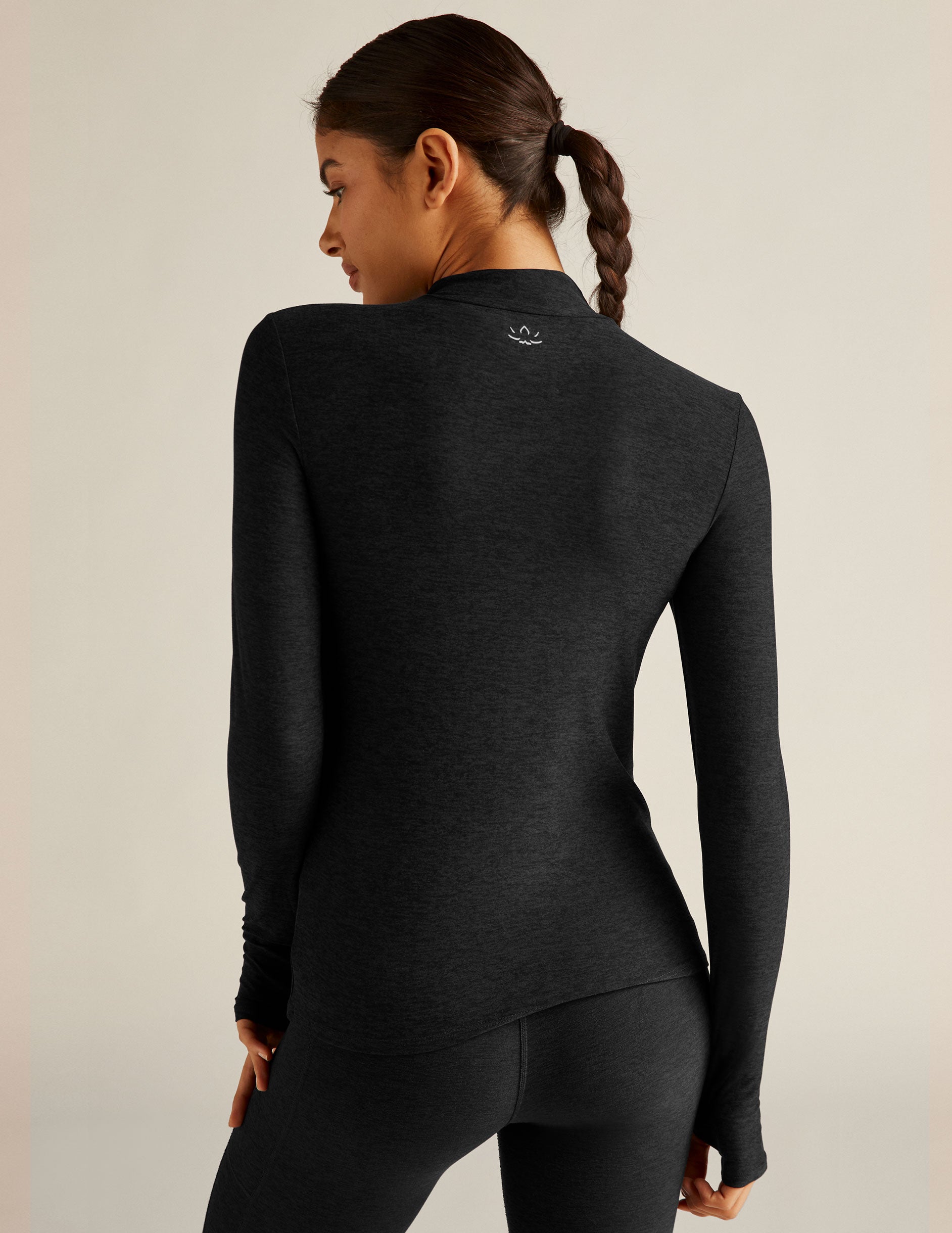 black mock neck pullover.