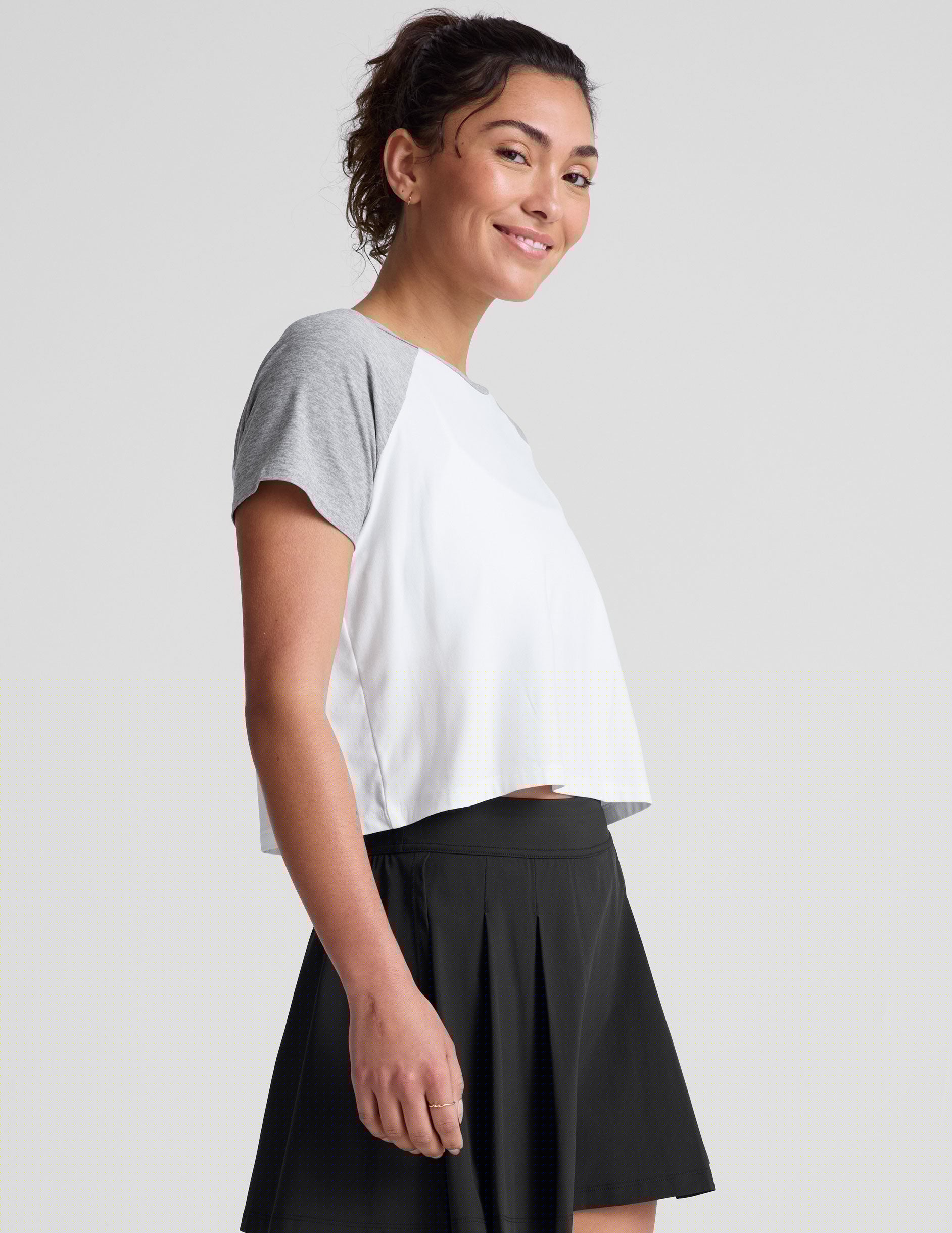 white relaxed fit t-shirt with colorblock raglan sleeve and neck binding.