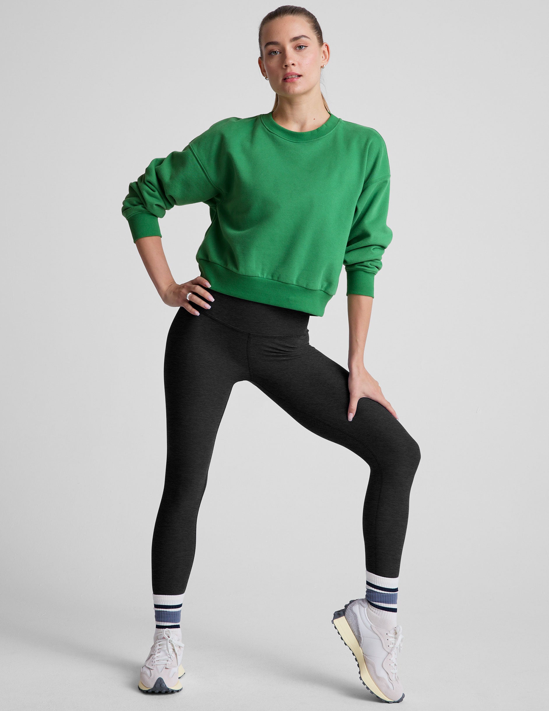 green crew neck sweatshirt.