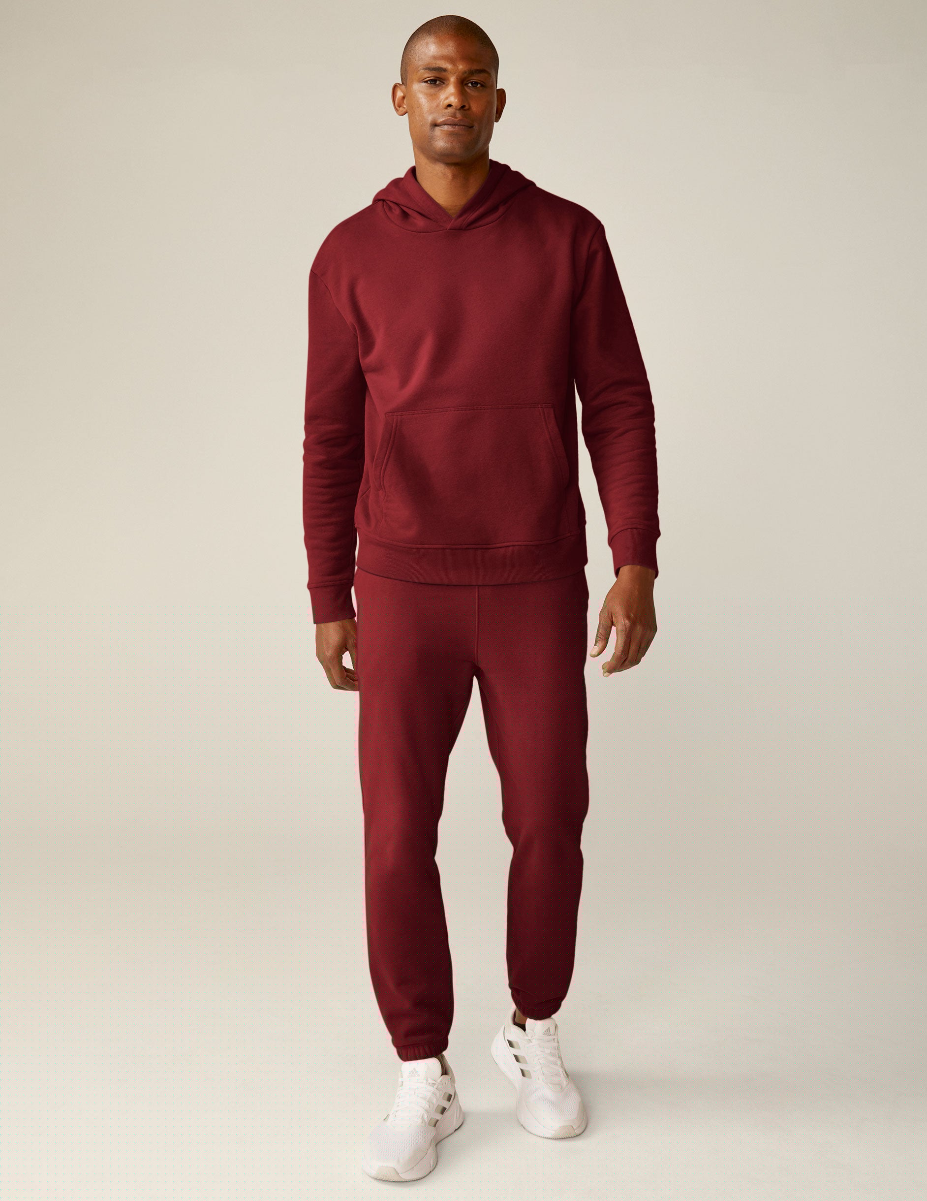 red pullover hoodie with a kangaroo pocket.