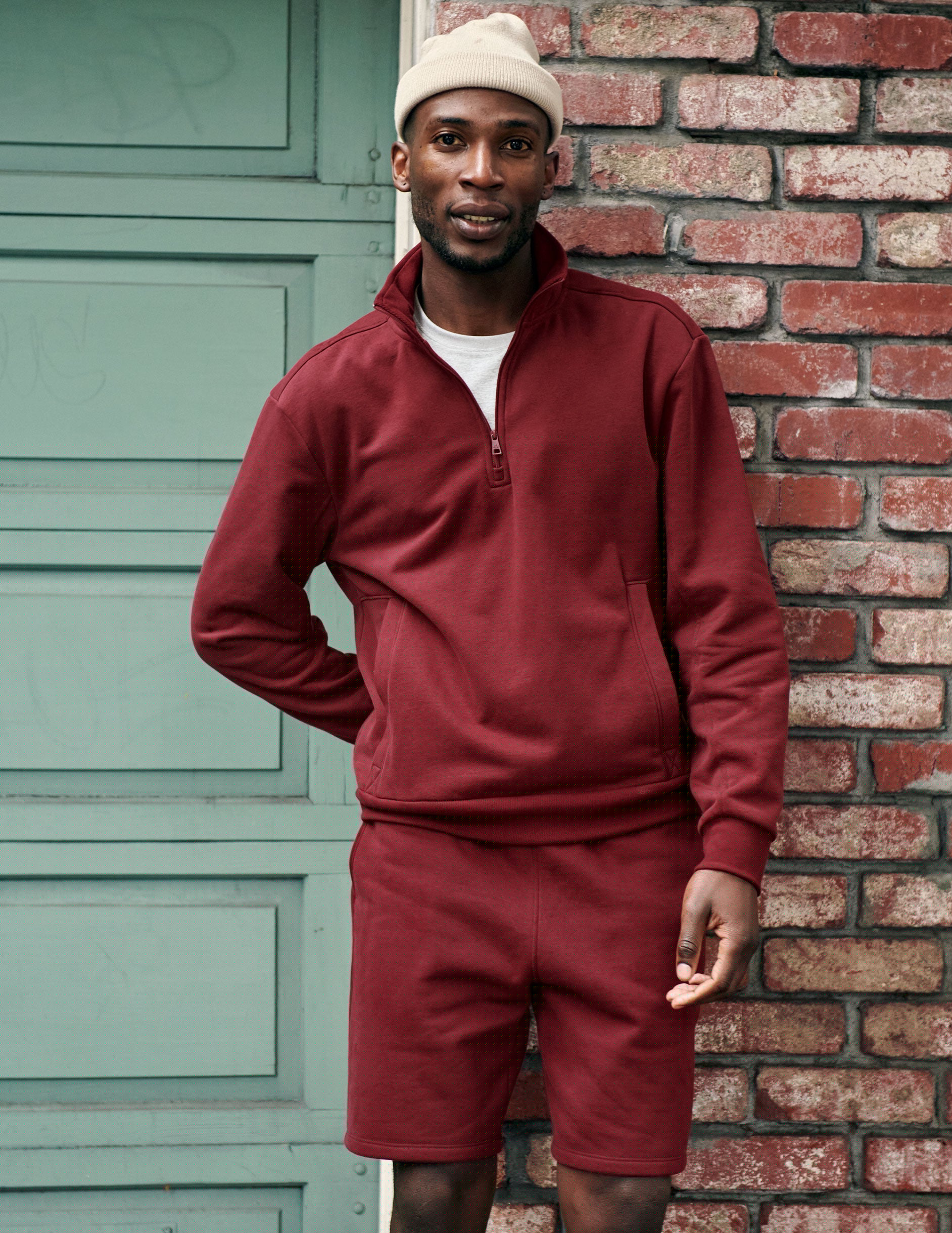 red men's quarter zip pullover with a kangaroo pocket.