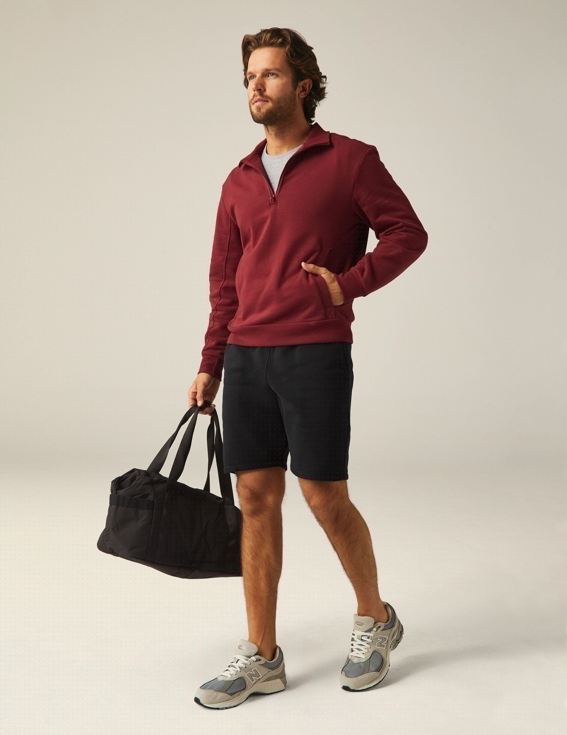 red men's quarter zip pullover with a kangaroo pocket.