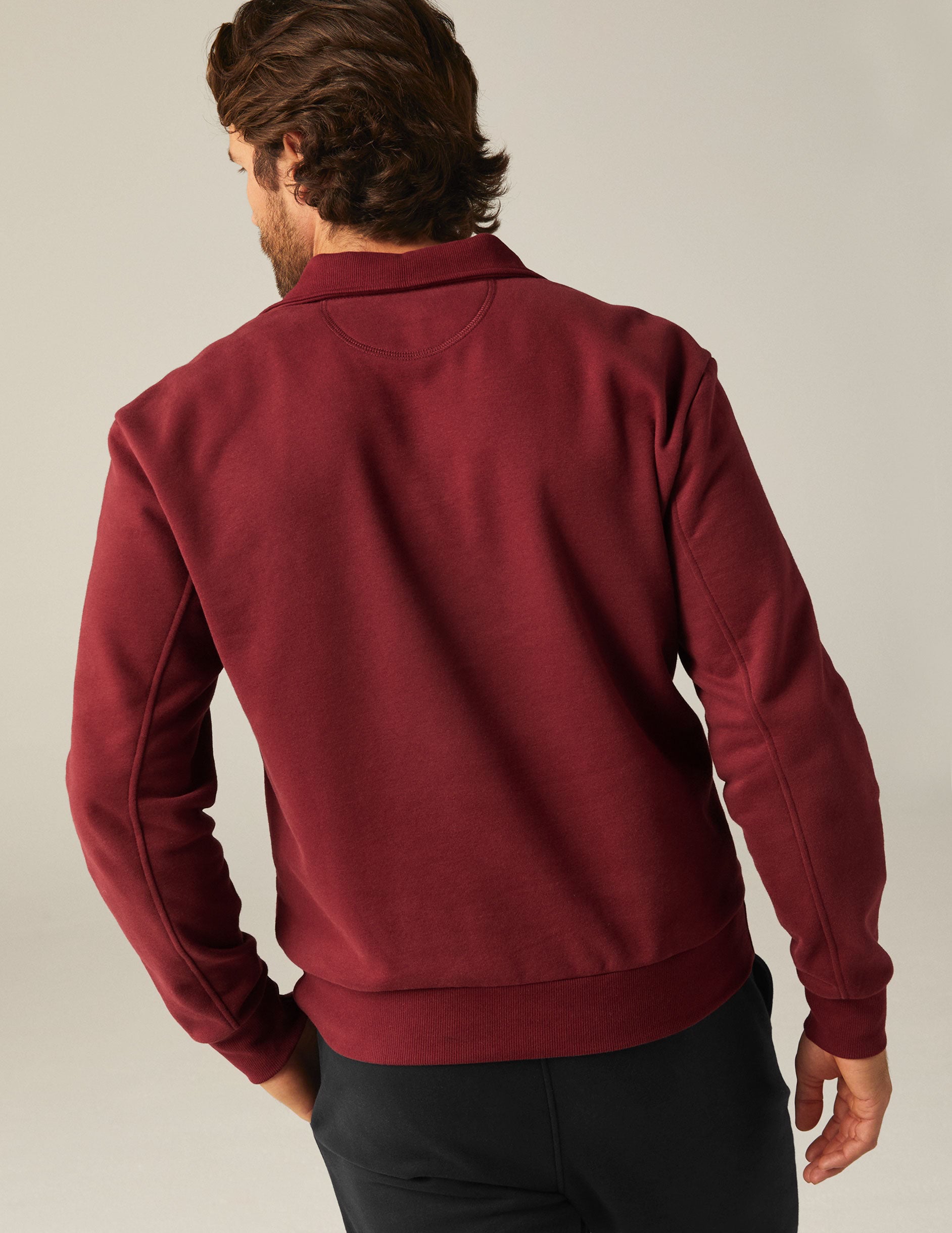 red men's quarter zip pullover with a kangaroo pocket.