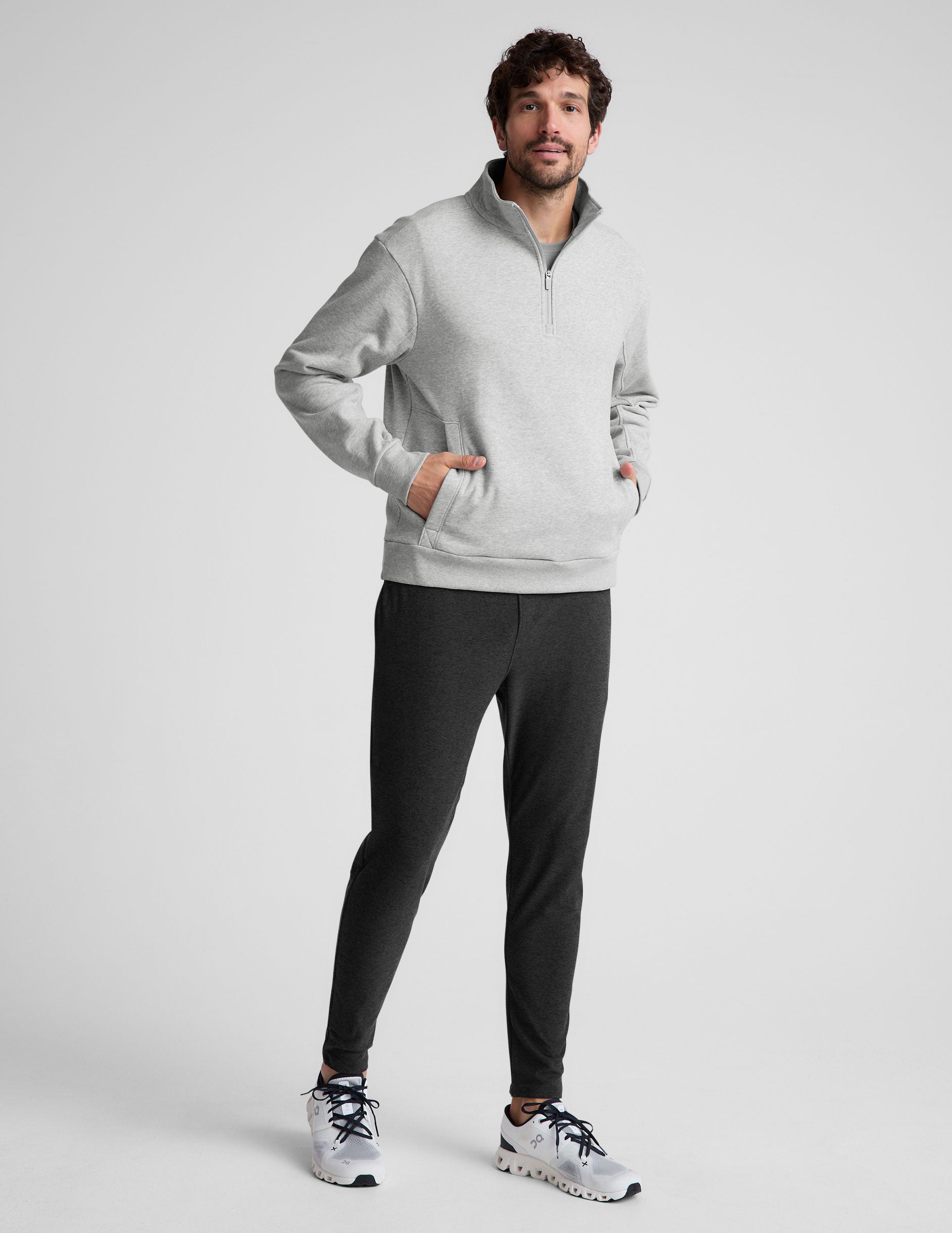 gray quarter zip jacket with kangaroo pocket.