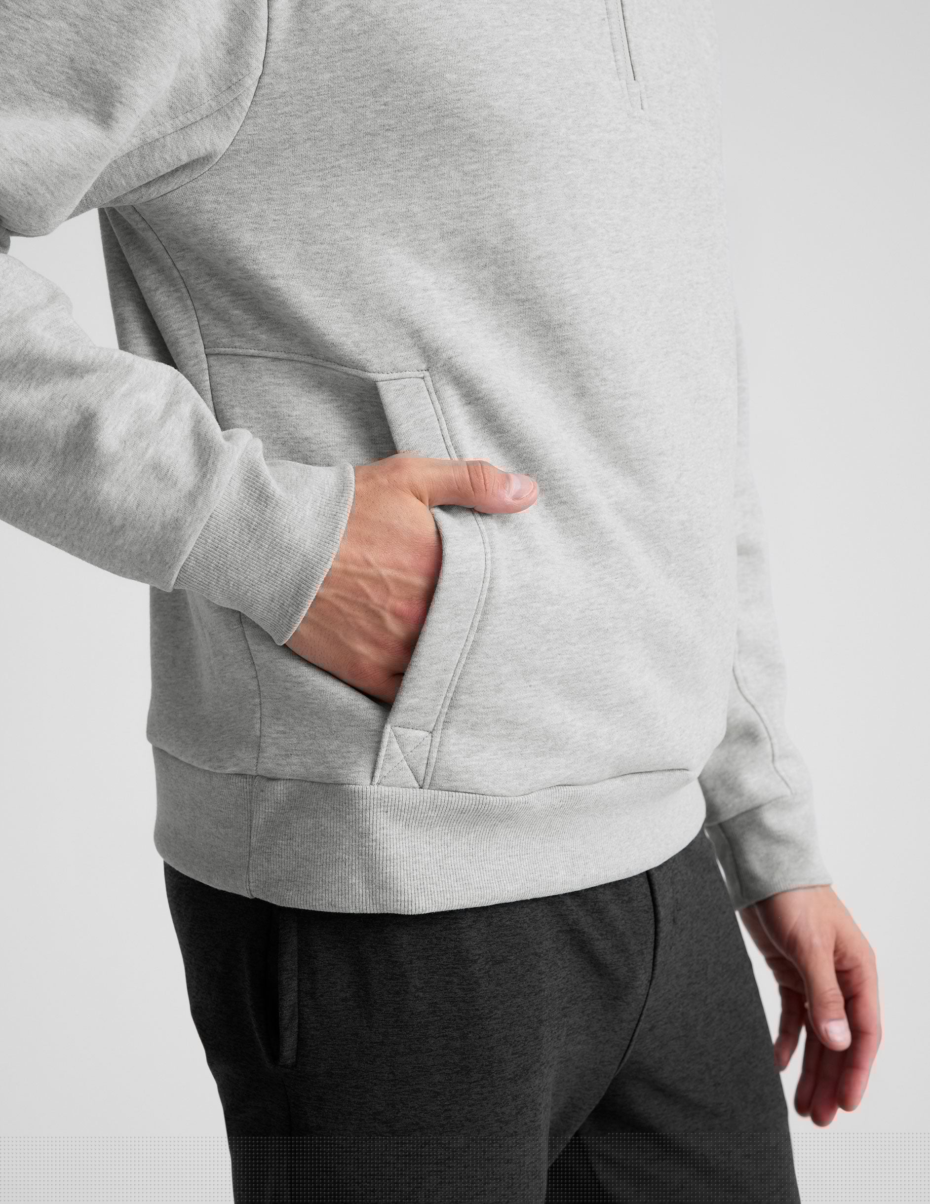 gray quarter zip jacket with kangaroo pocket.