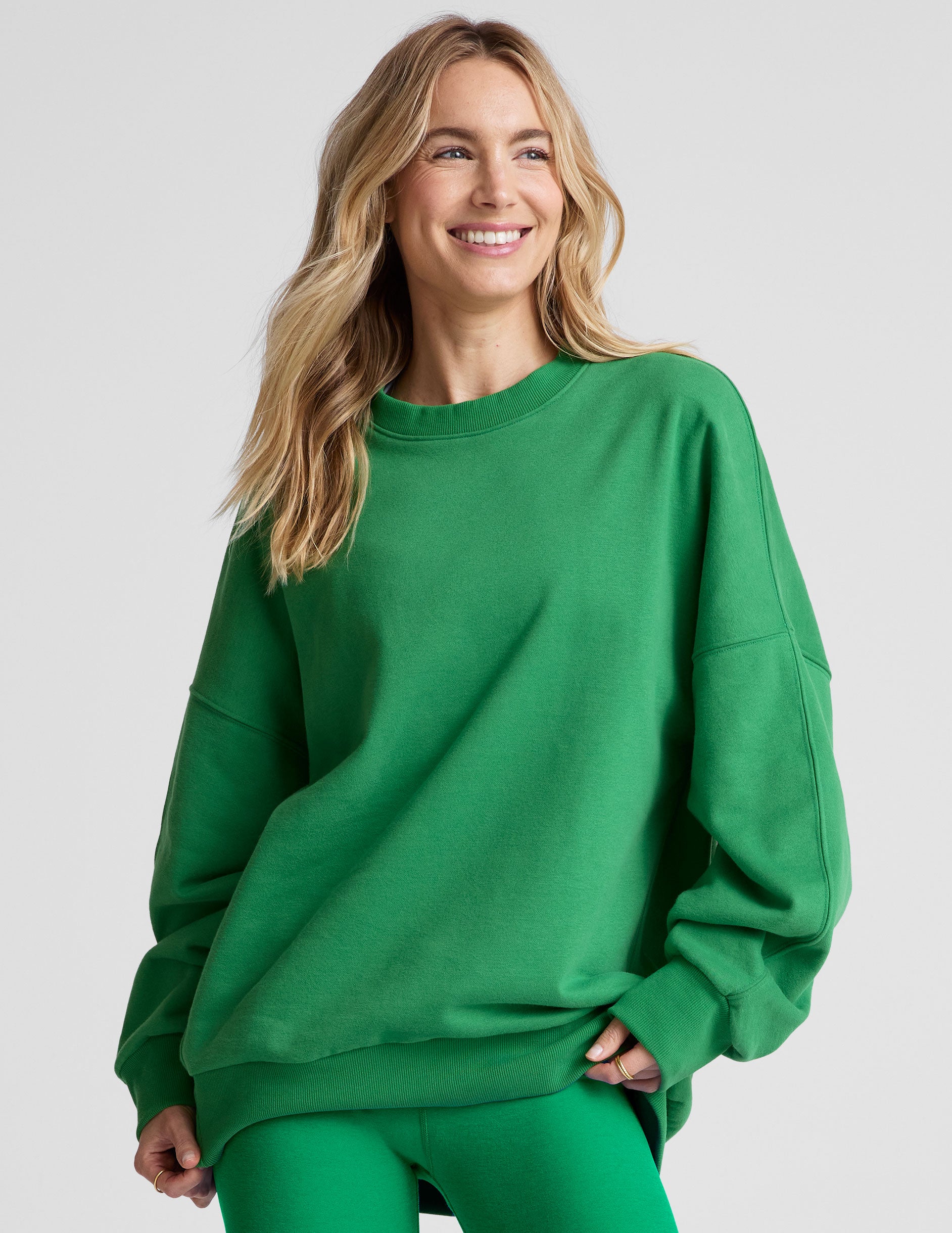 green crewneck oversized sweatshirt.