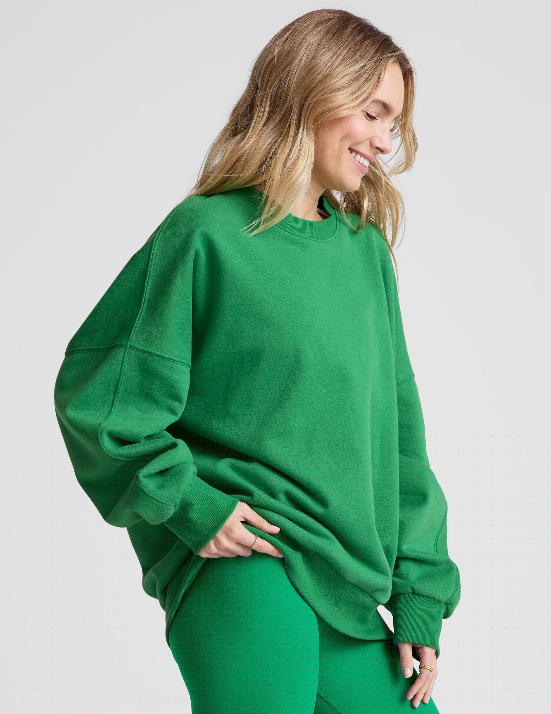green crewneck oversized sweatshirt.