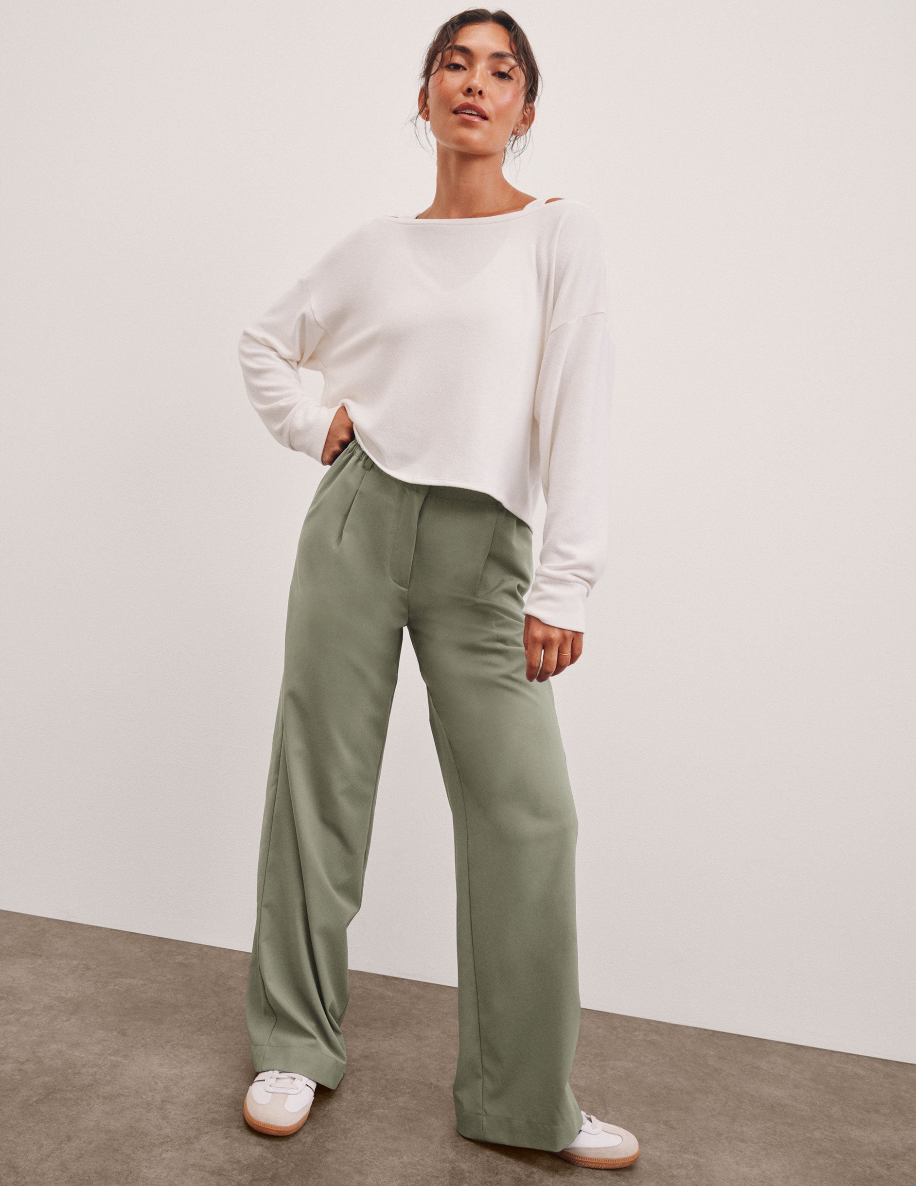 white boatneck long sleeve pullover.