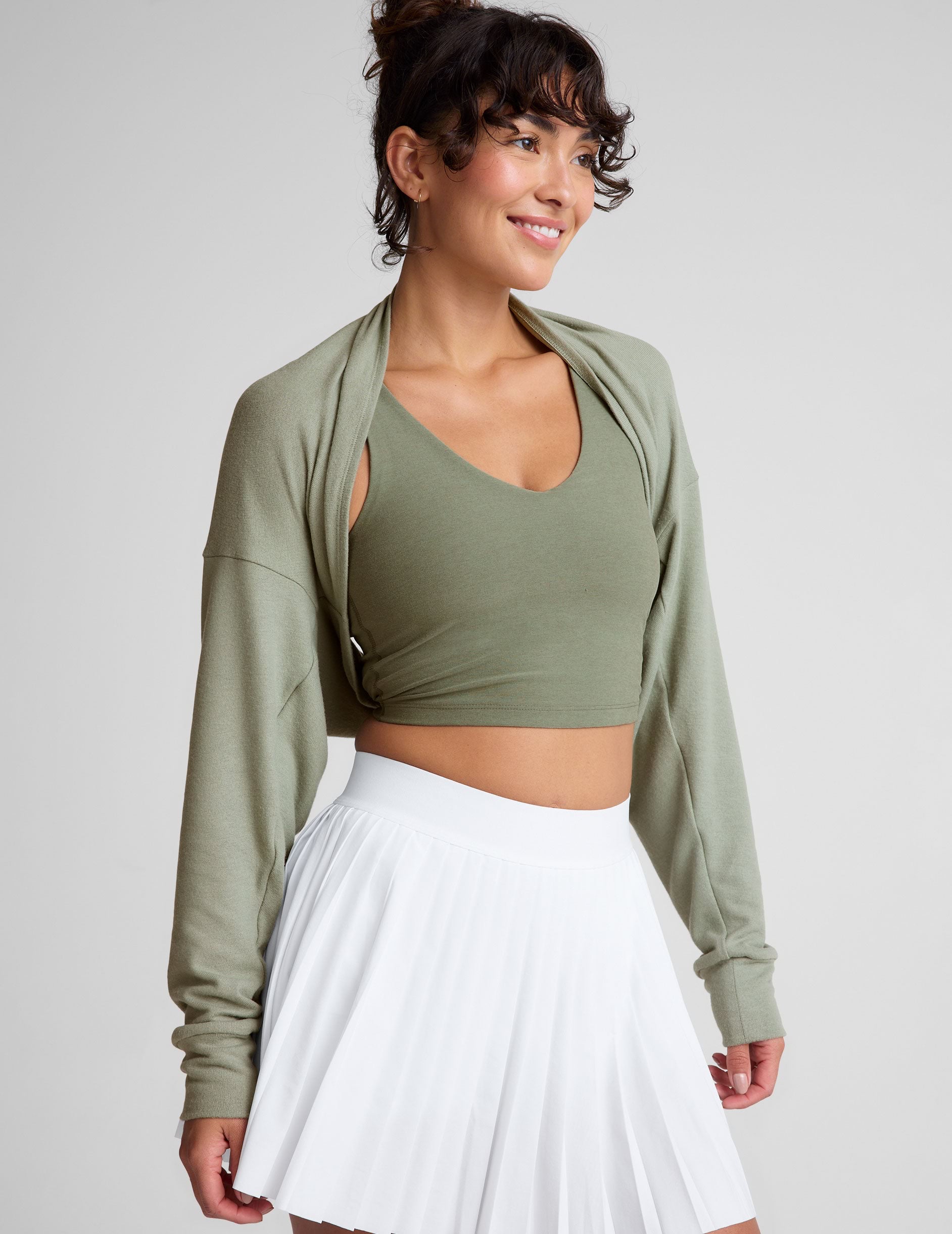 green 2-way long sleeve cropped shrug.