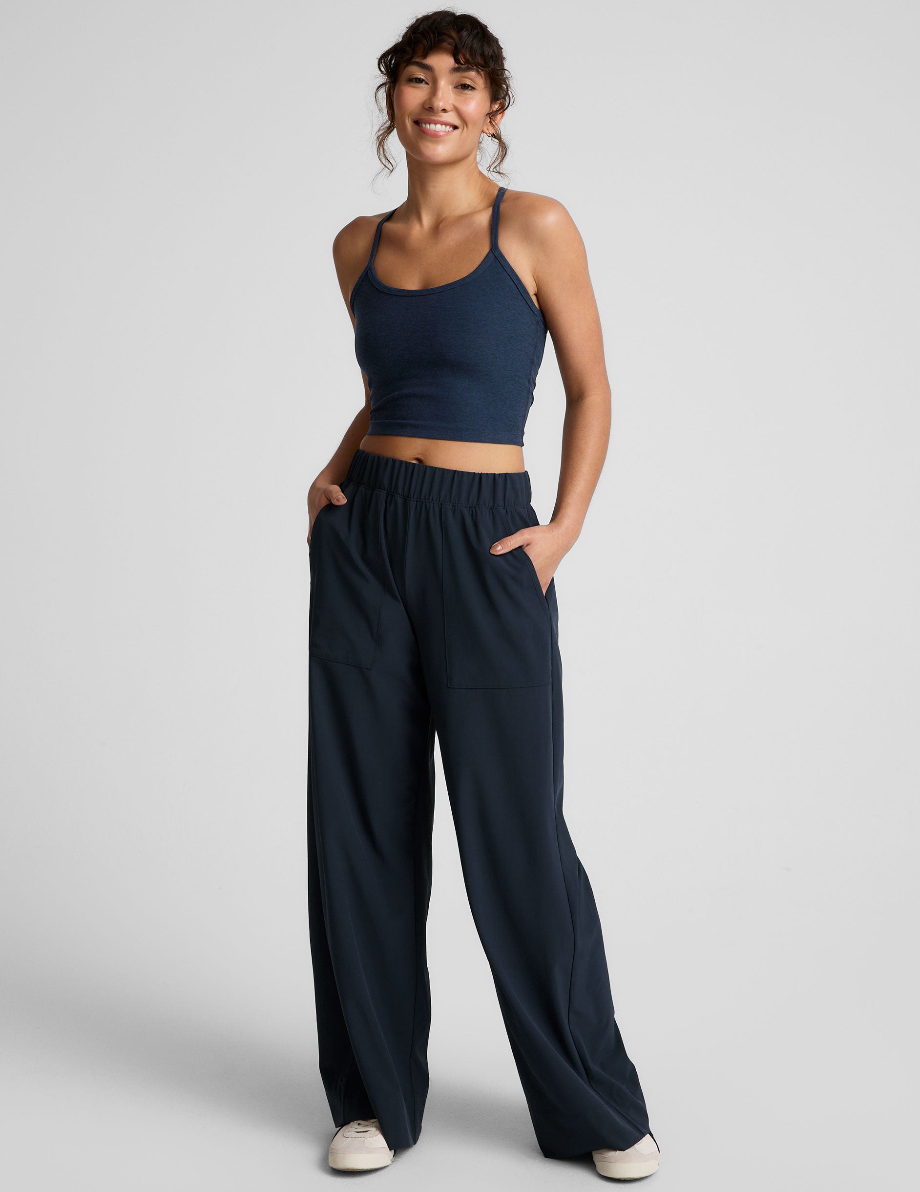 blue mid-rise 31" inseam wide leg pant with pockets.