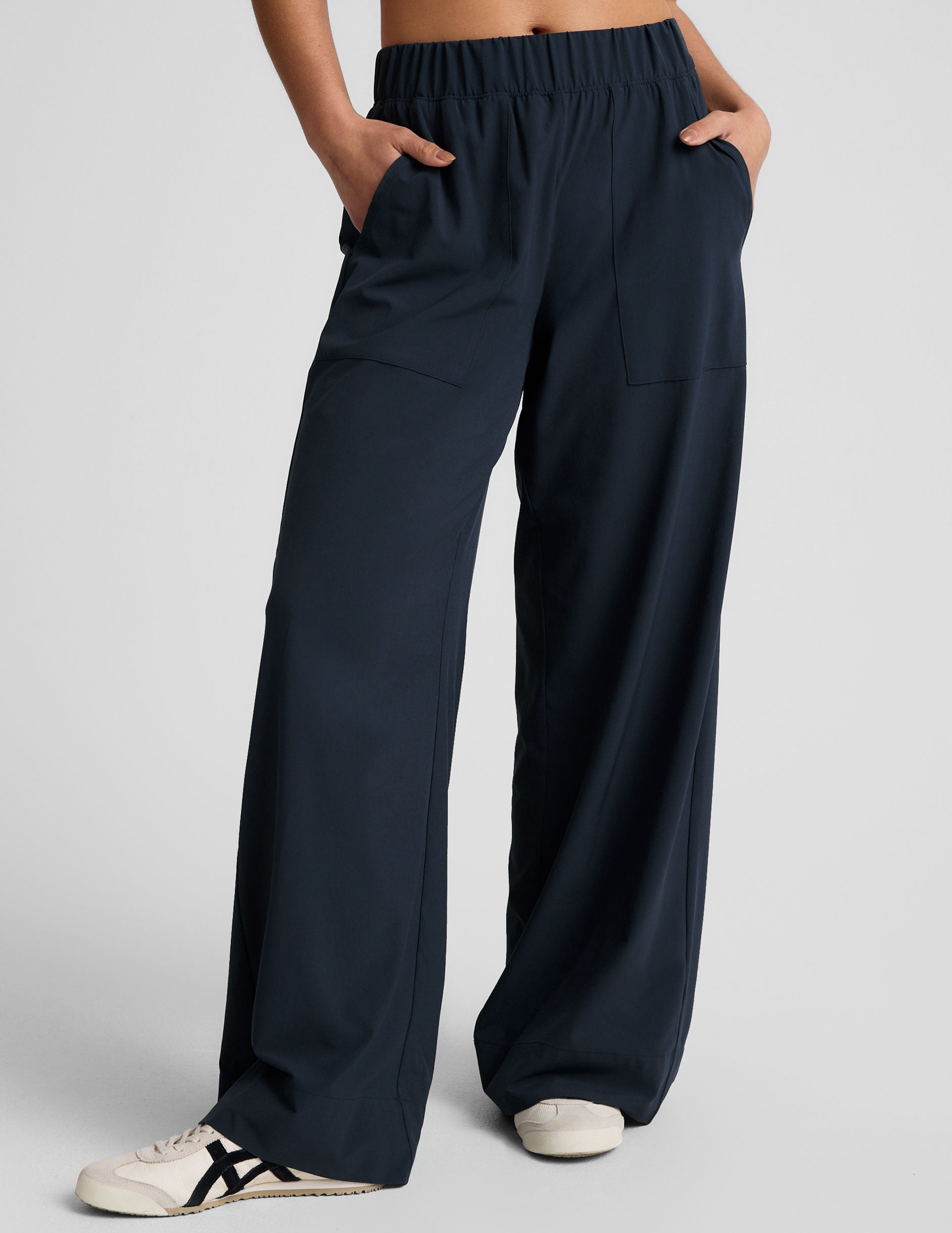 blue mid-rise 31" inseam wide leg pant with pockets.