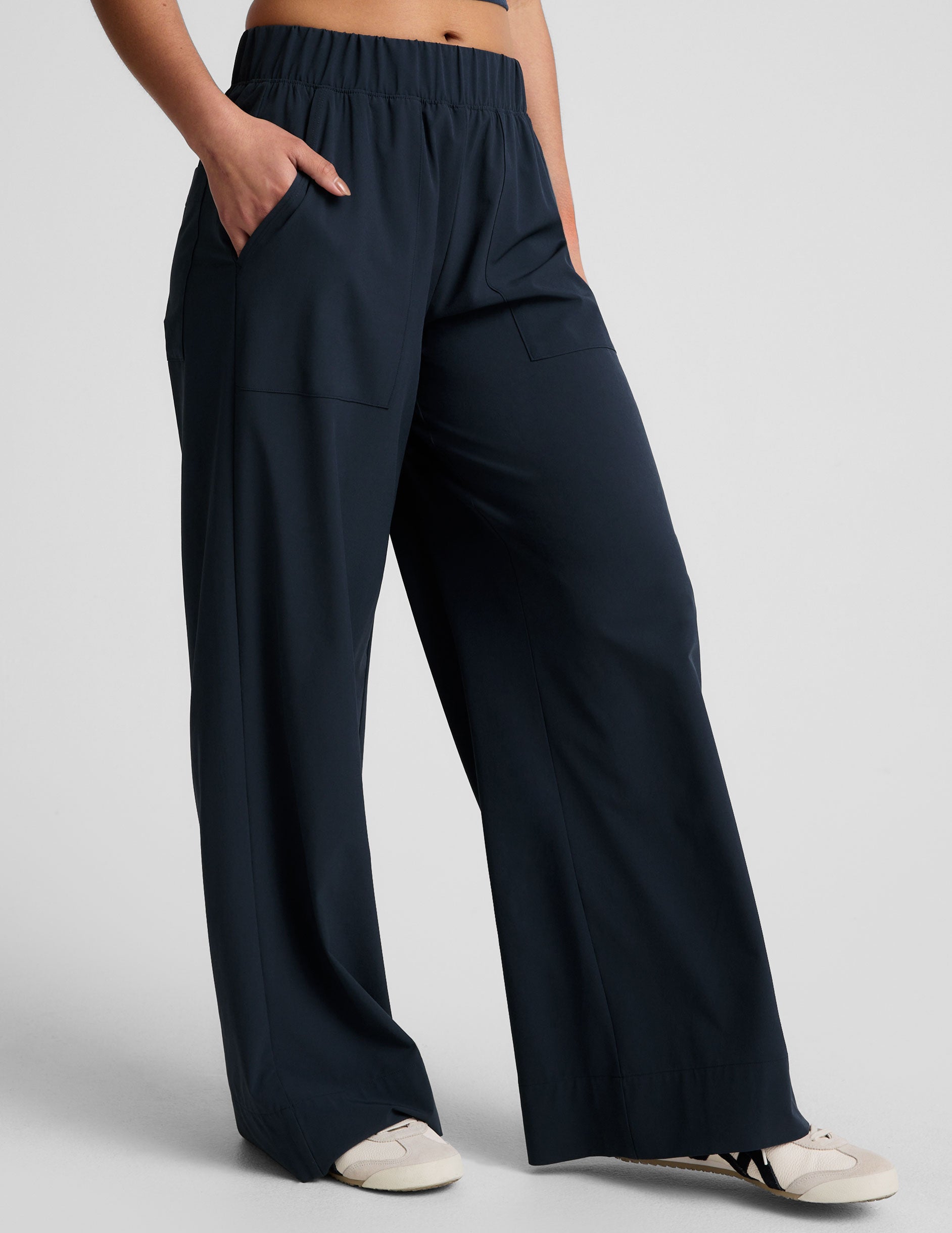 blue mid-rise 31" inseam wide leg pant with pockets.