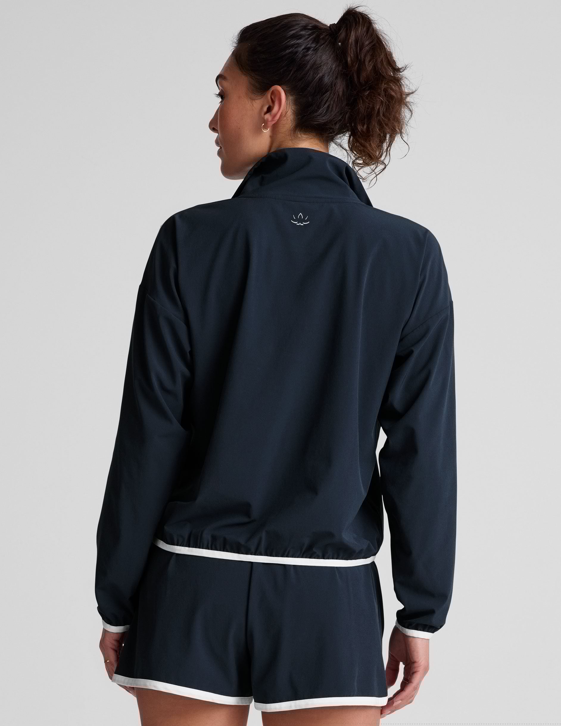 blue pullover with a half zip front and front kangaroo pocket.