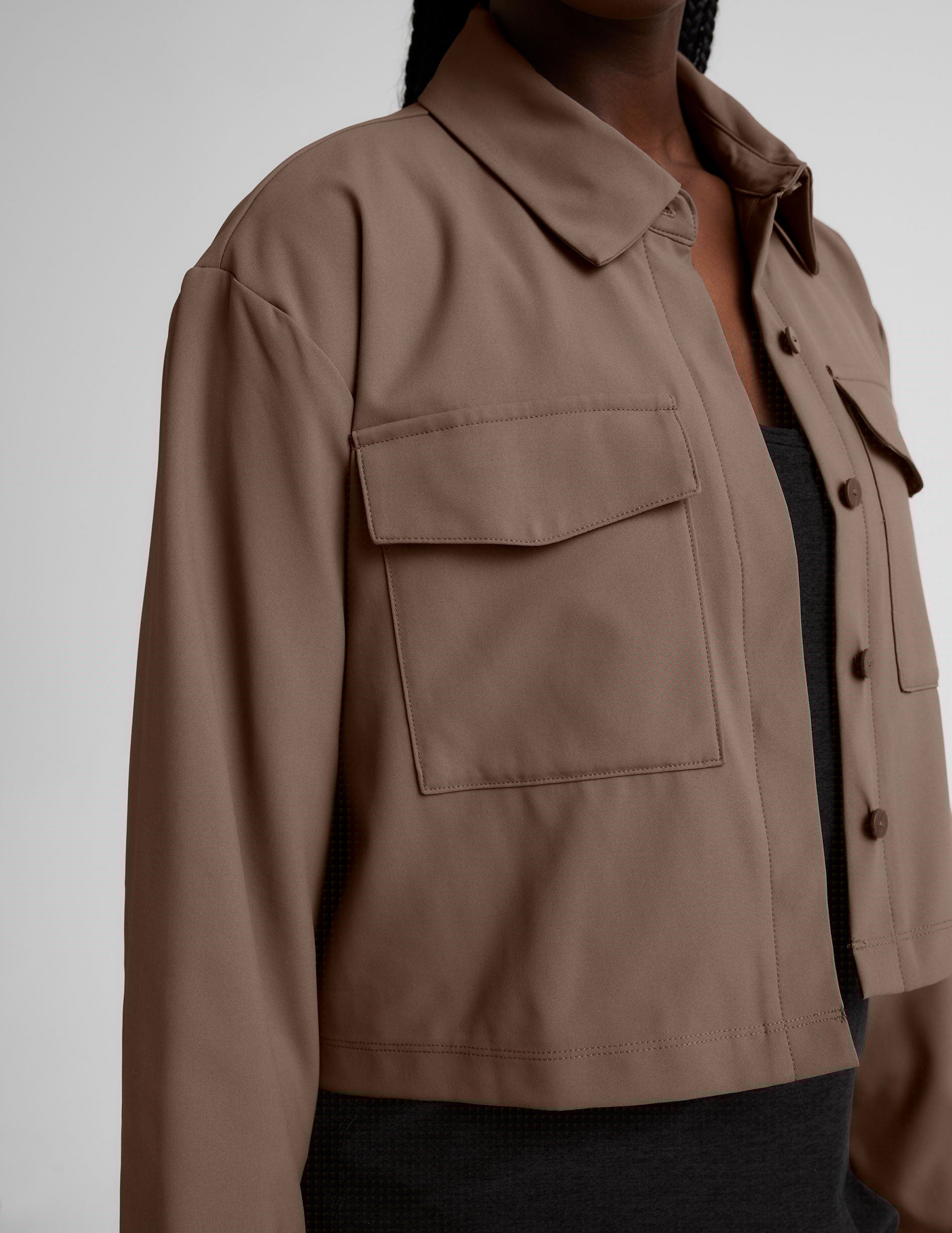 brown button down cropped jacket.
