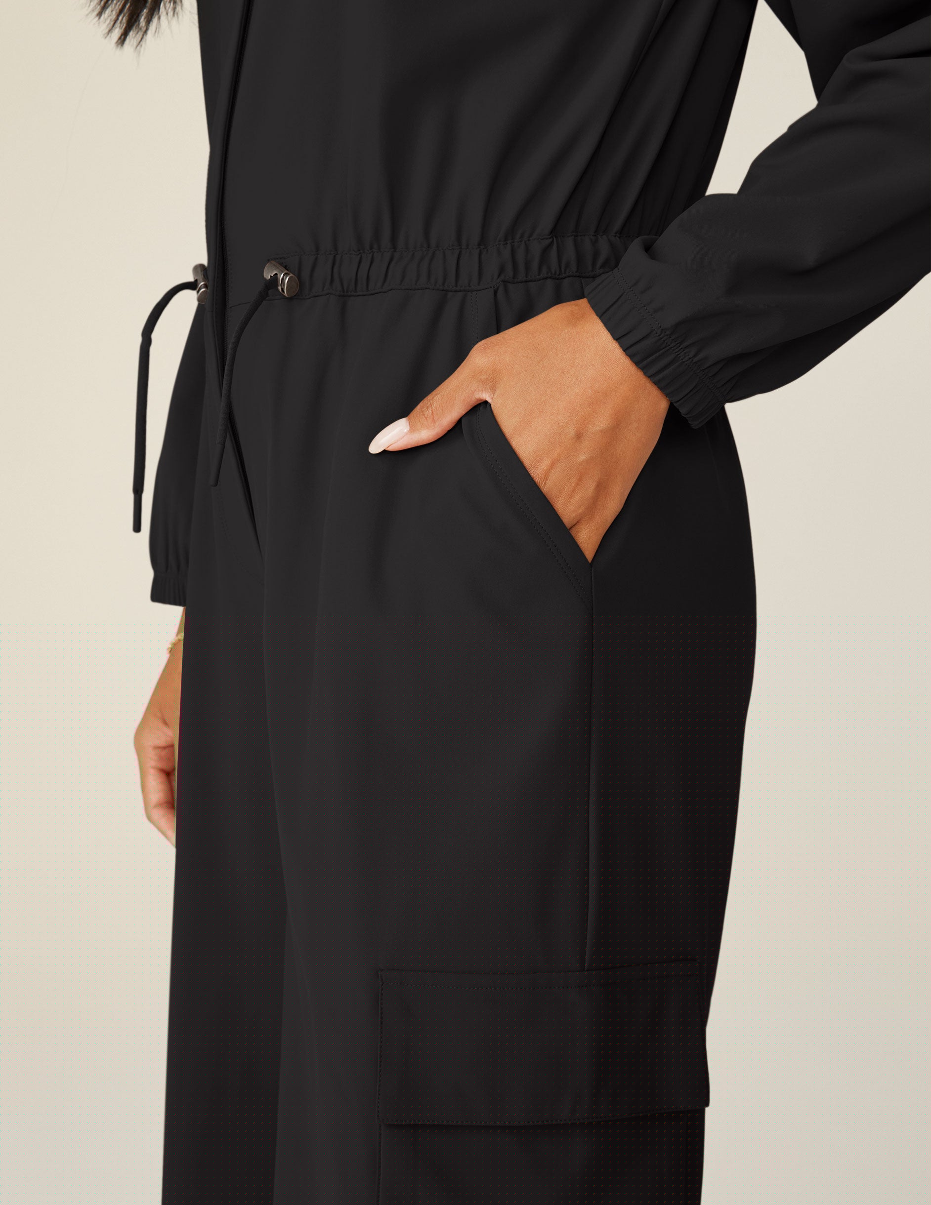 black cargo style long sleeve jumpsuit.