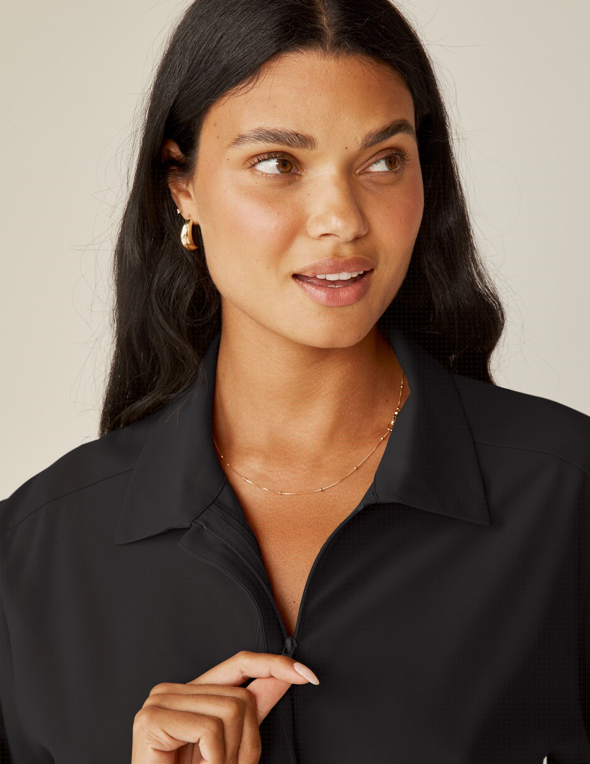 black cargo style long sleeve jumpsuit.