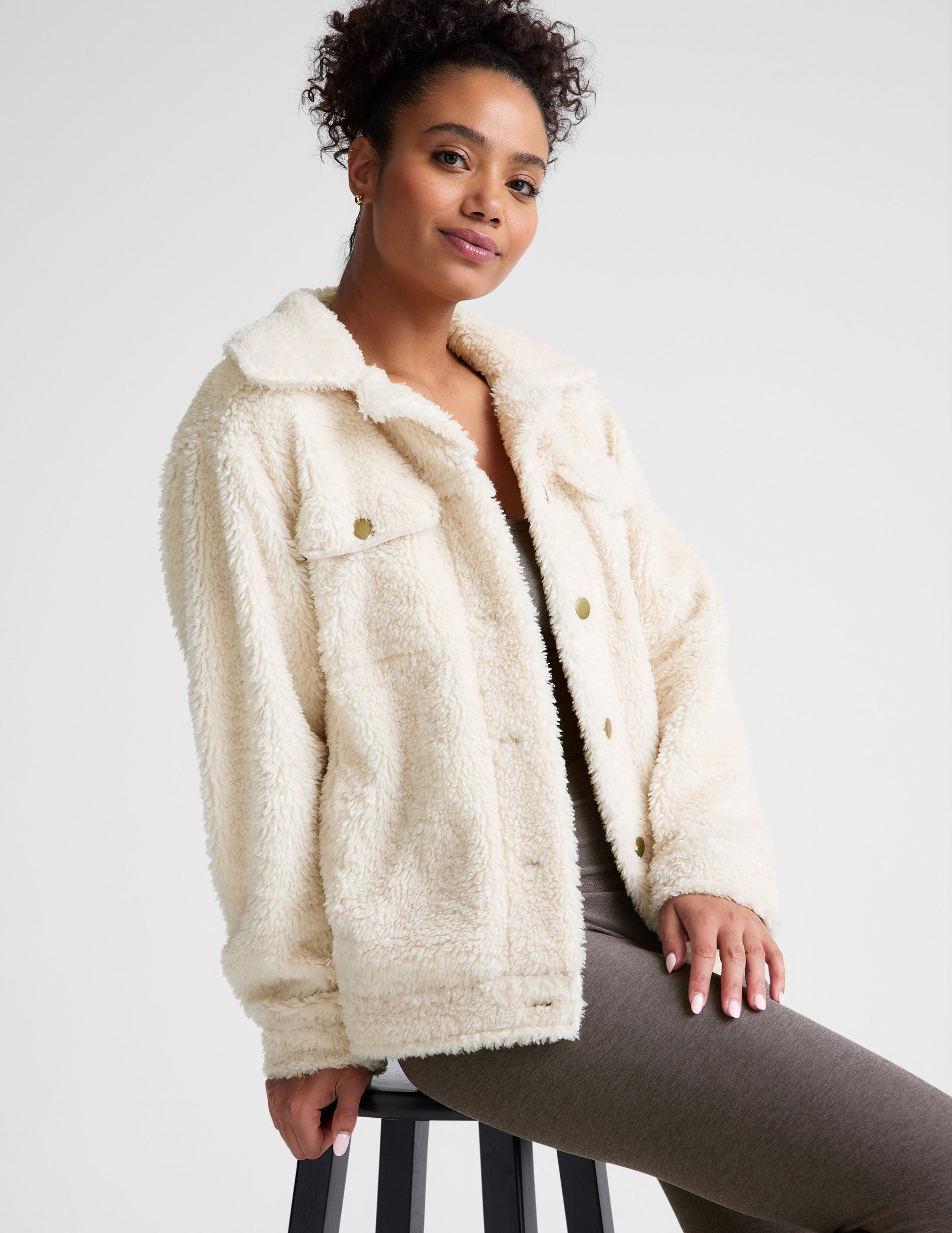 white button up faux sherpa jacket with pockets.