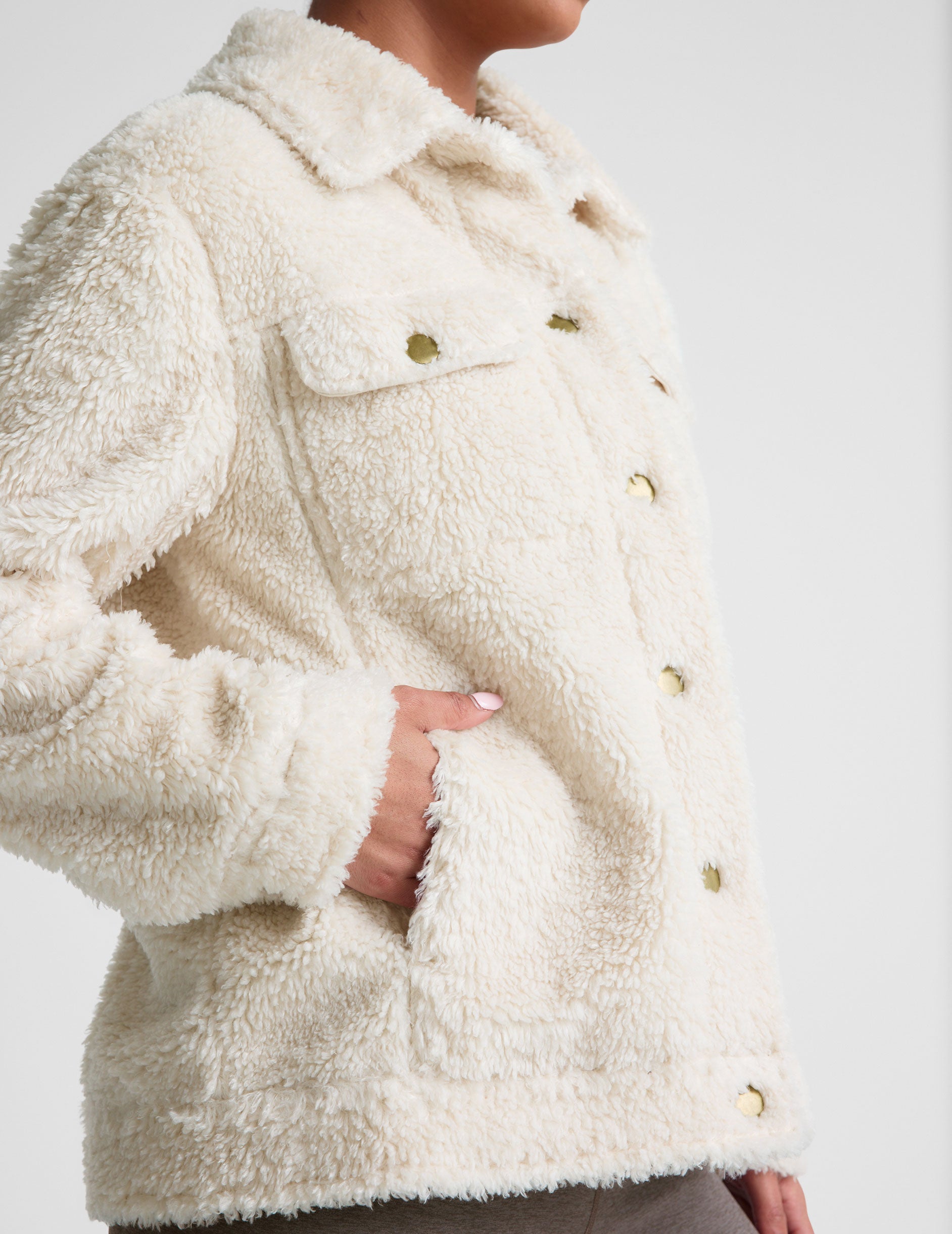 white button up faux sherpa jacket with pockets.
