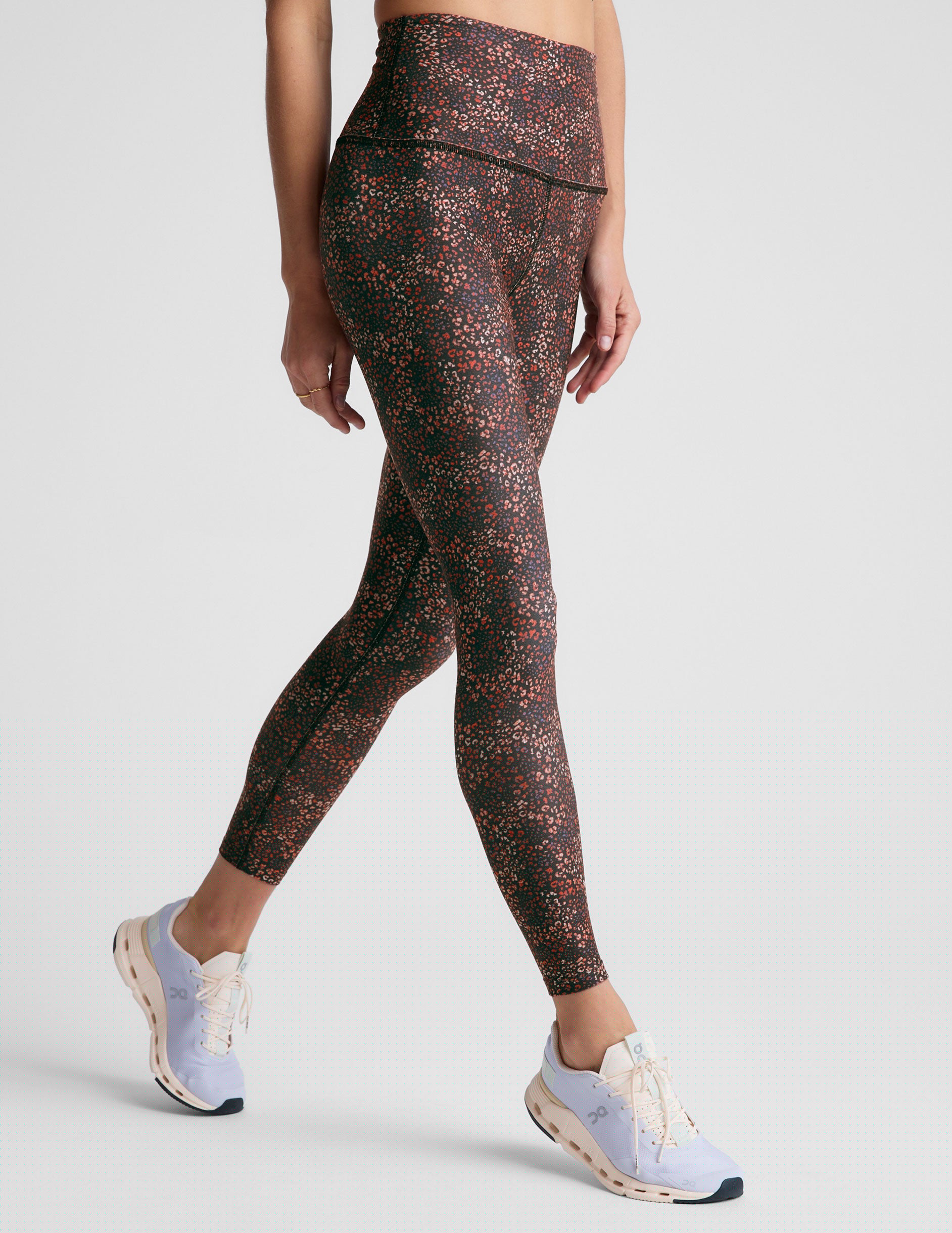 leopard printed high-waisted midi length leggings.