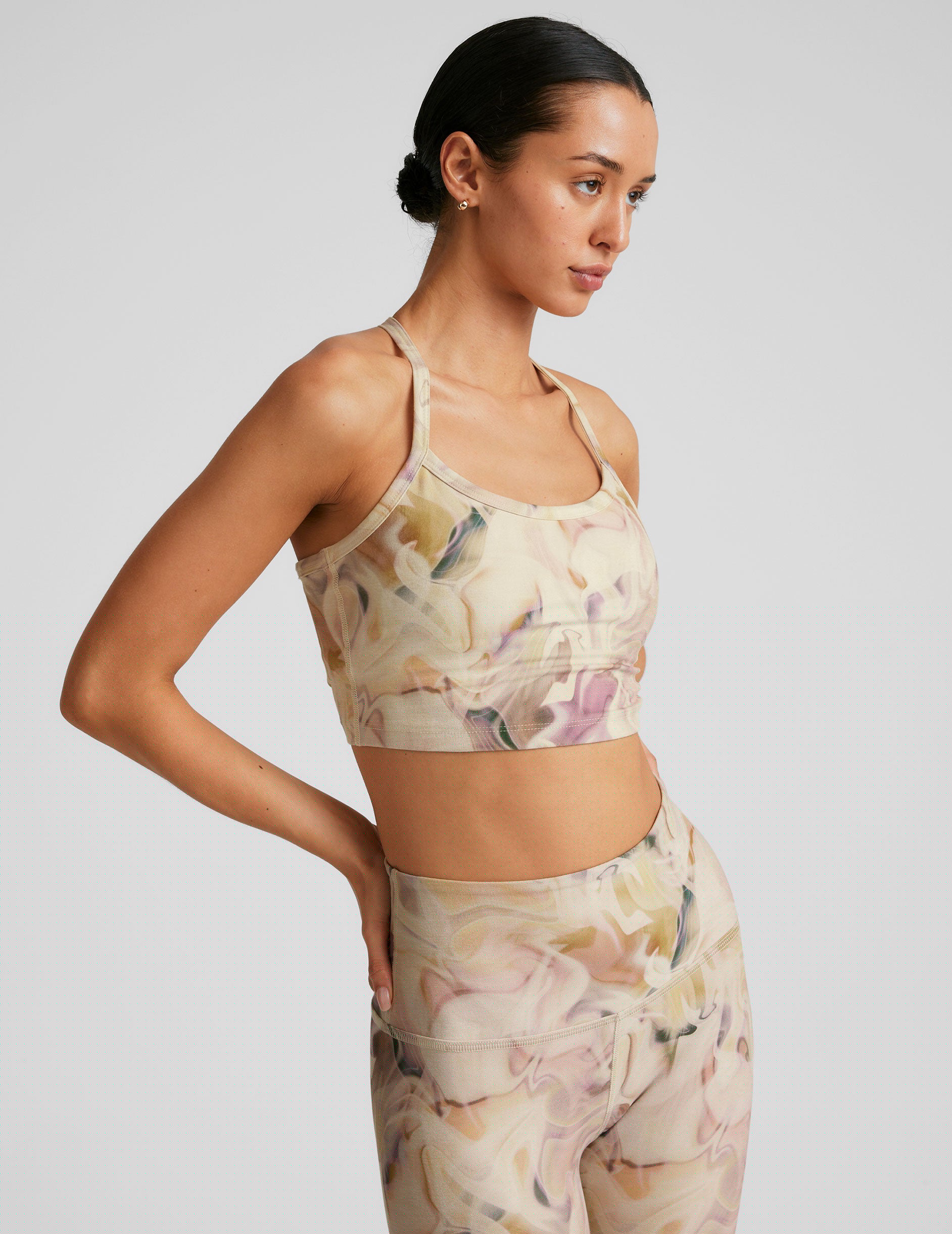 swirl printed racerback cropped tank top with spaghetti straps.
