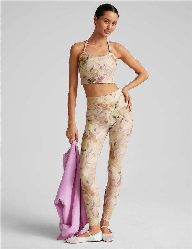 swirl printed racerback cropped tank top with spaghetti straps.