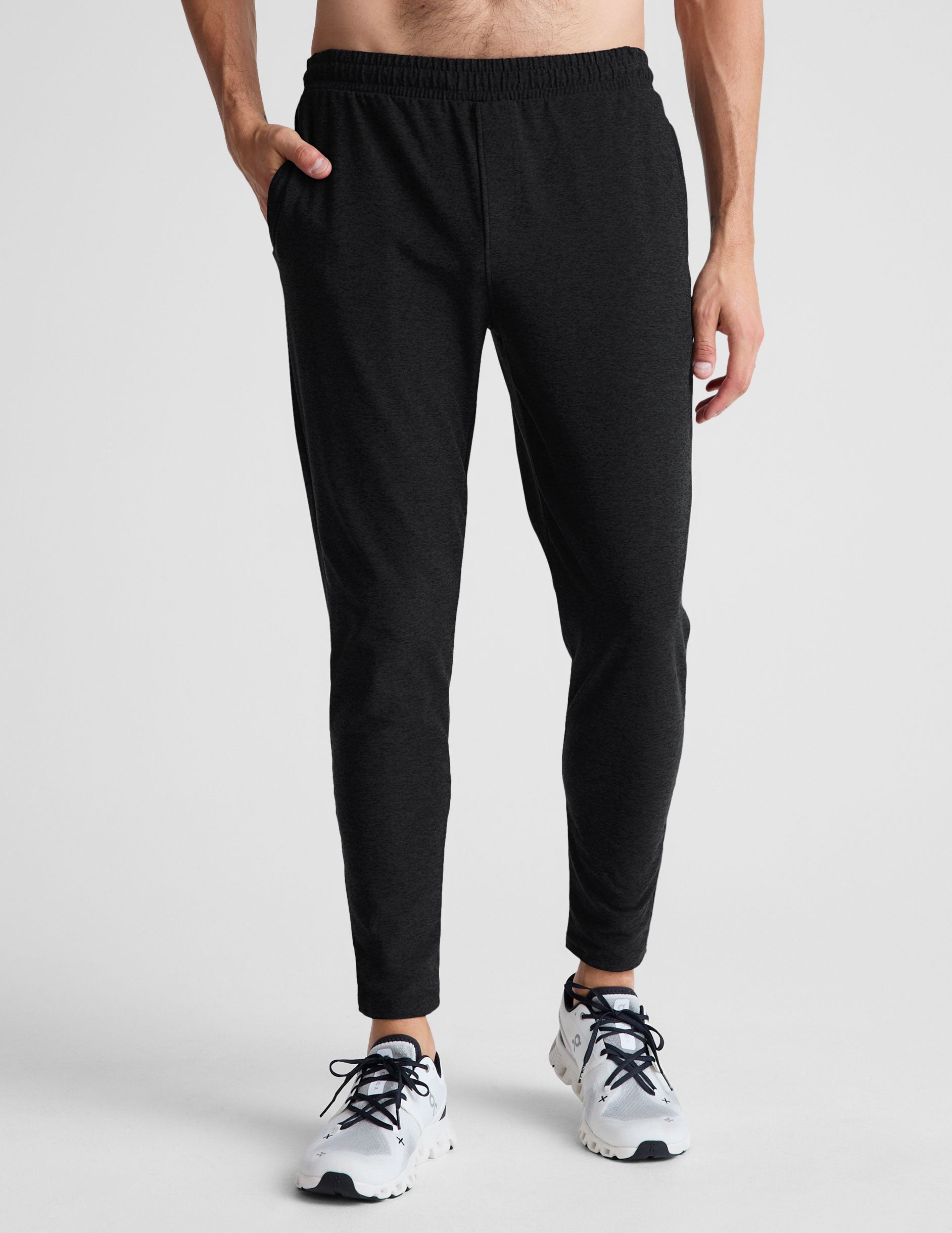 black men's athleisure pants with an internal drawcord and pockets.