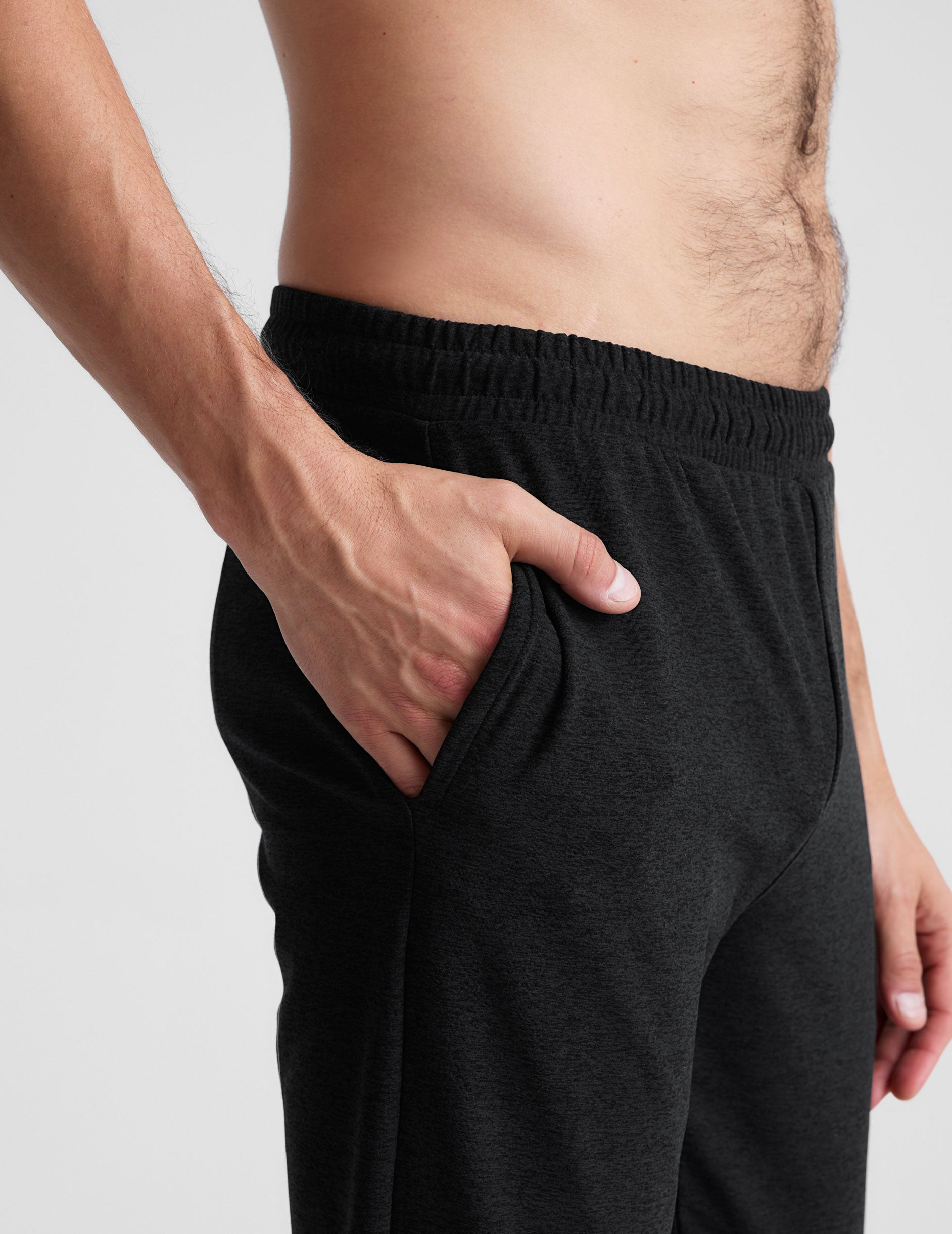 black men's athleisure pants with an internal drawcord and pockets.