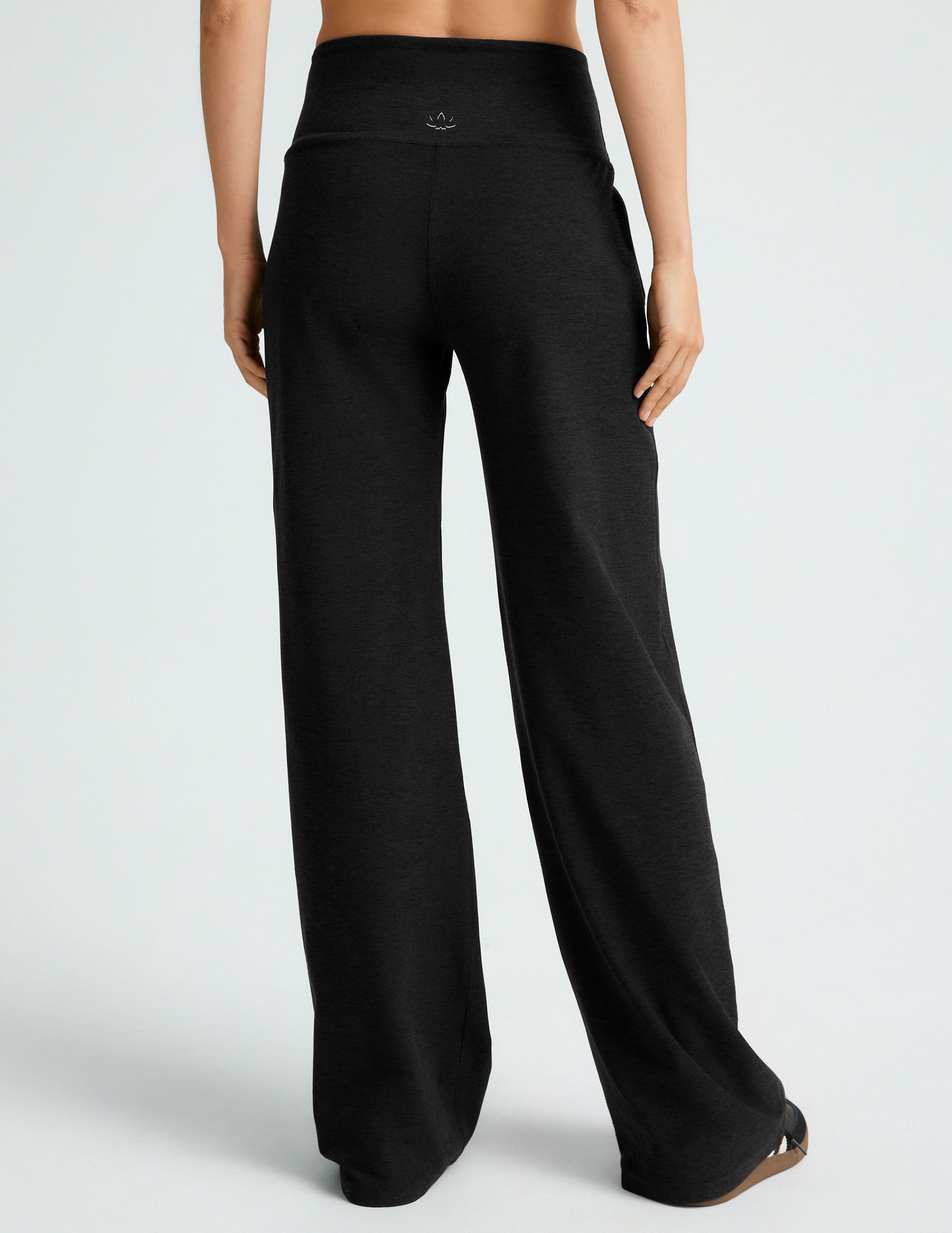 black high-waisted 29" inseam pants with pockets.