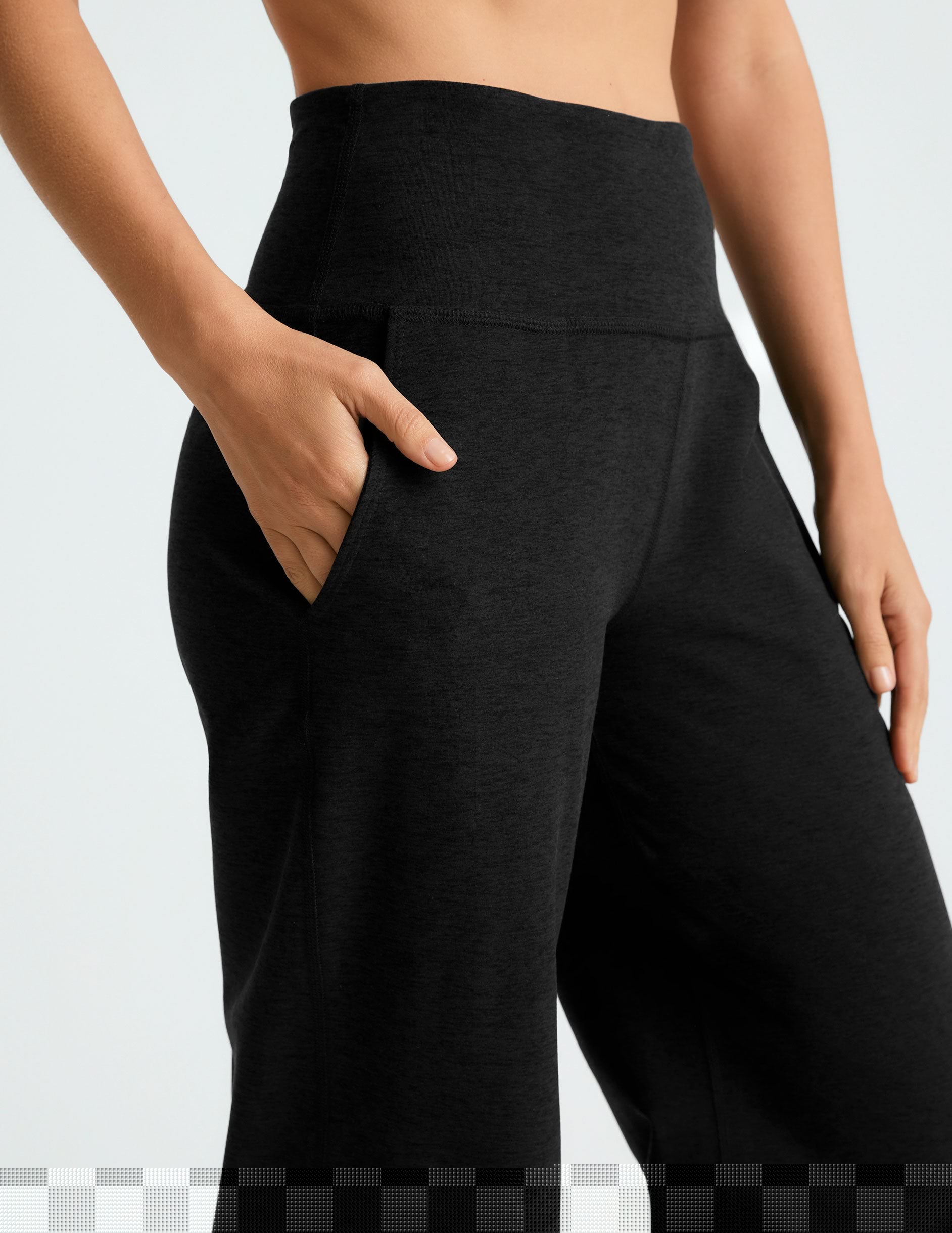 black high-waisted 29" inseam pants with pockets.