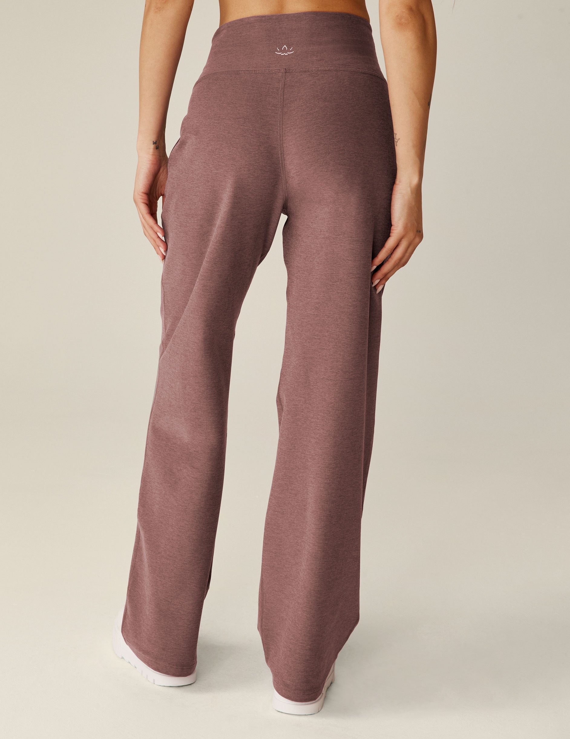 red high-waisted wide leg pants with pockets.