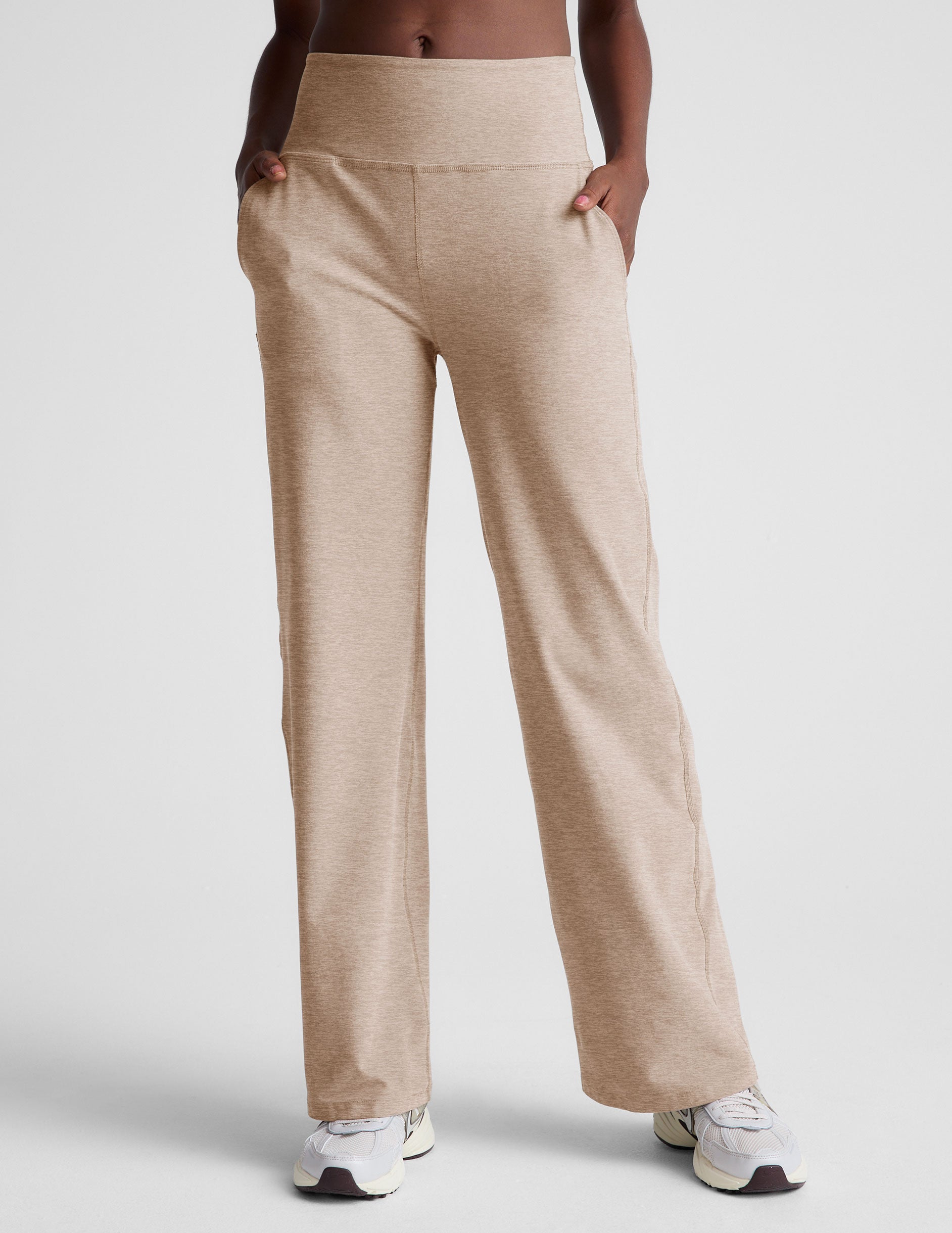 brown high-waisted pants with pockets.